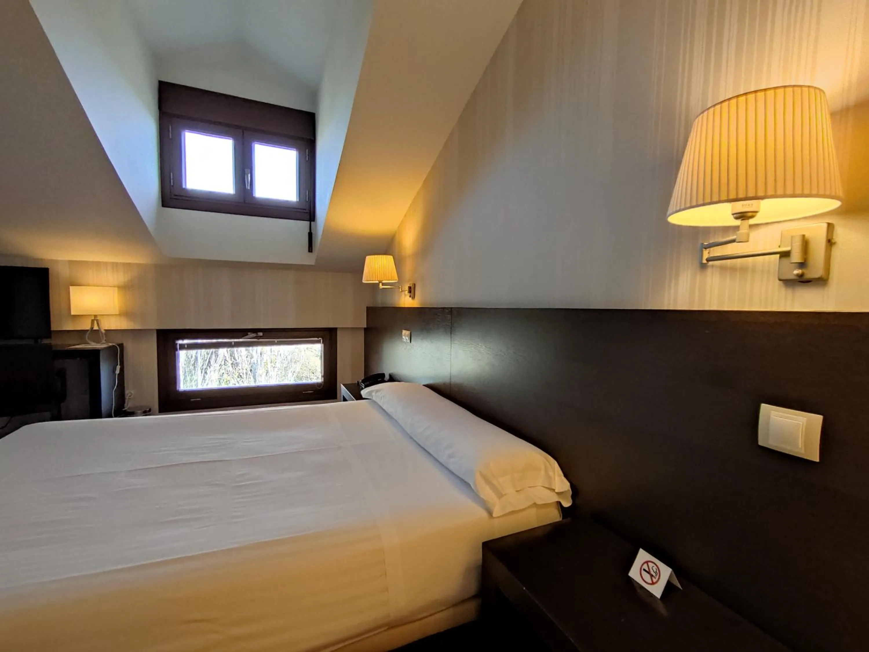 Bed in Hotel Puerta del Arco