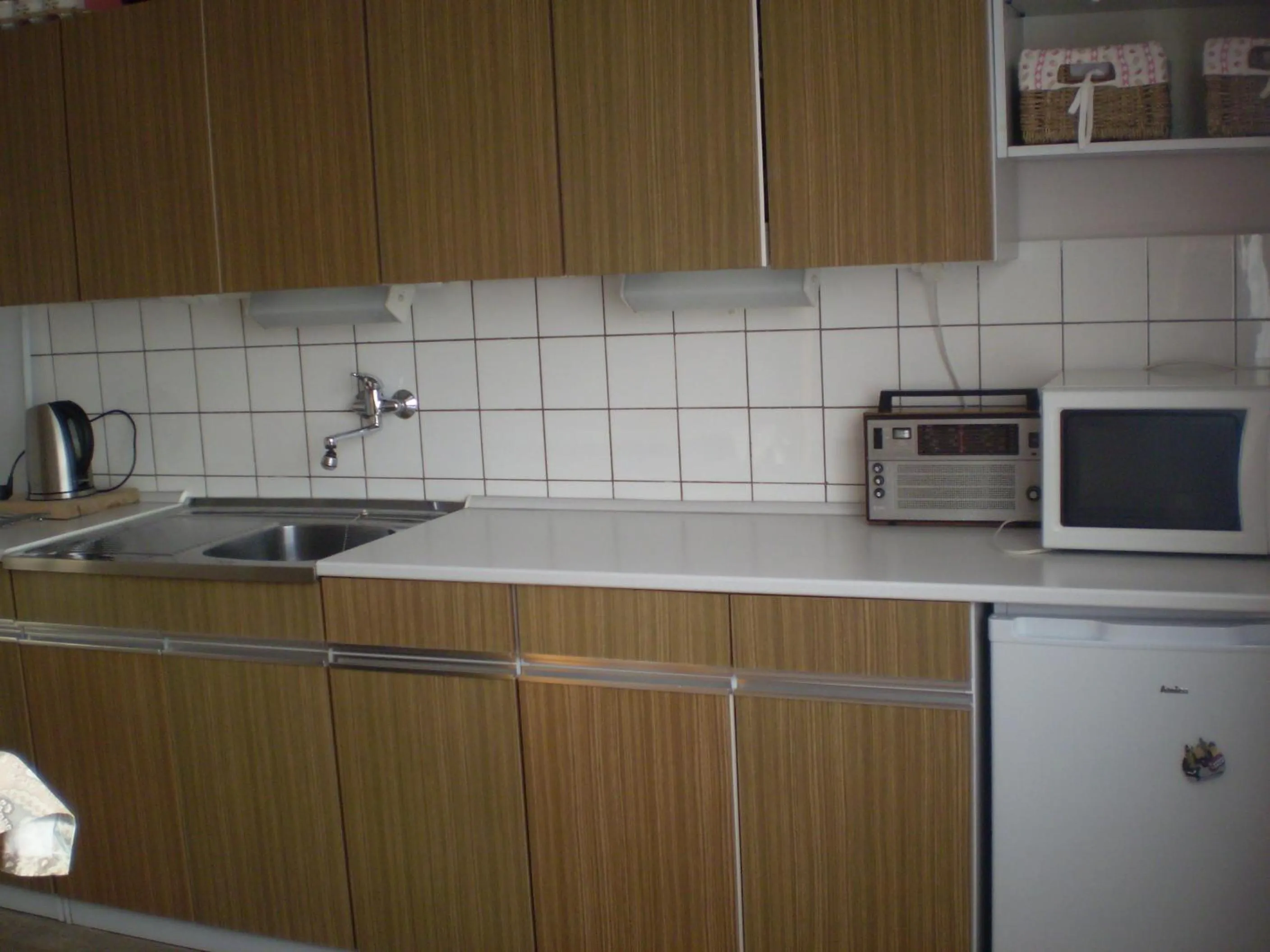 Kitchen or kitchenette in apartman pro 4 osoby