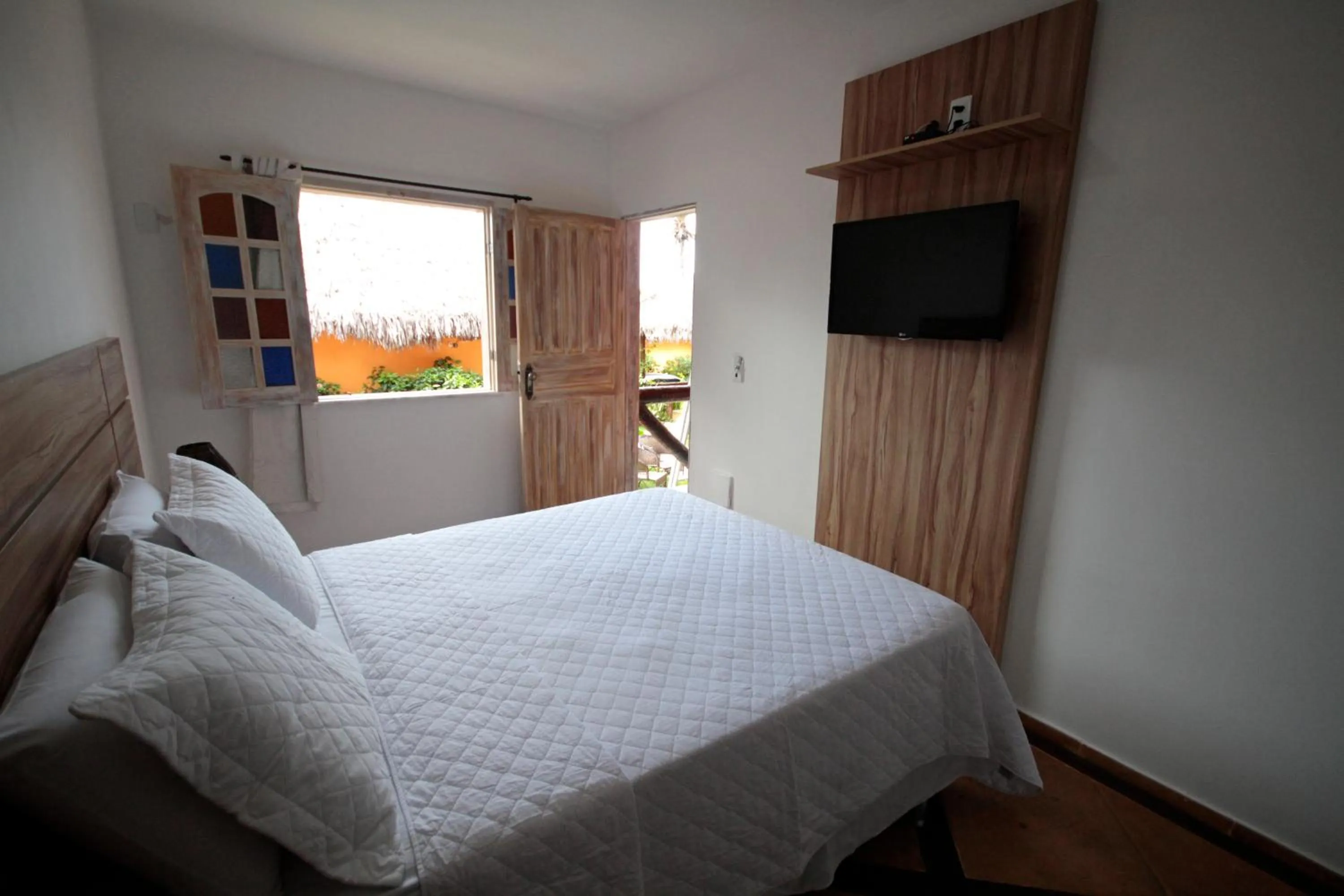 Bed in Pousada Tranquilandia Village