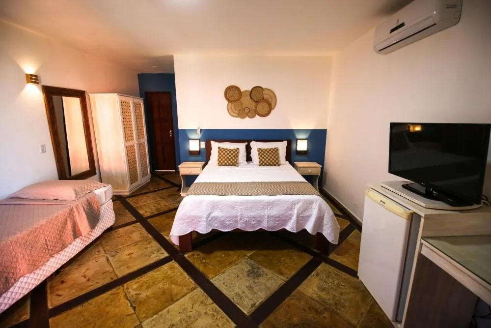 Bed in Pousada Tranquilandia Village