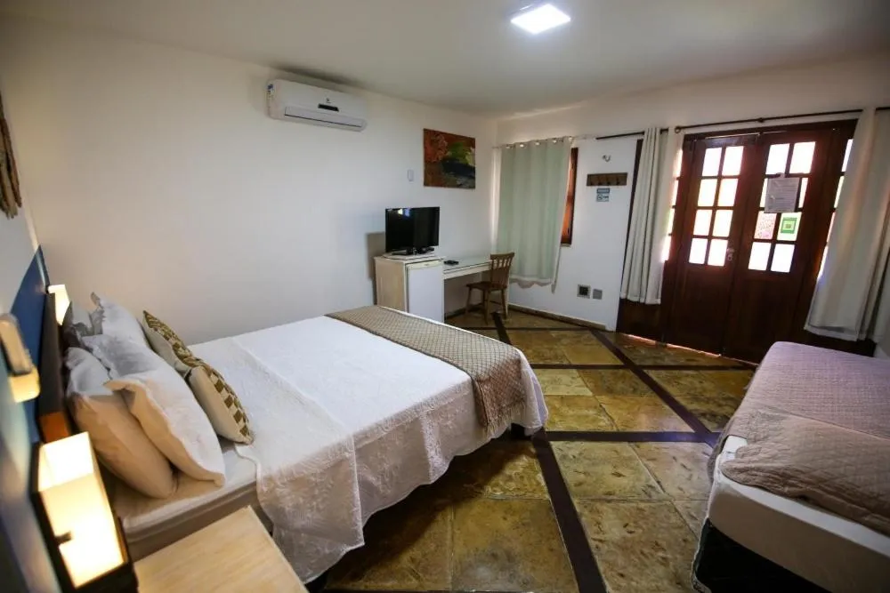 Bed in Pousada Tranquilandia Village