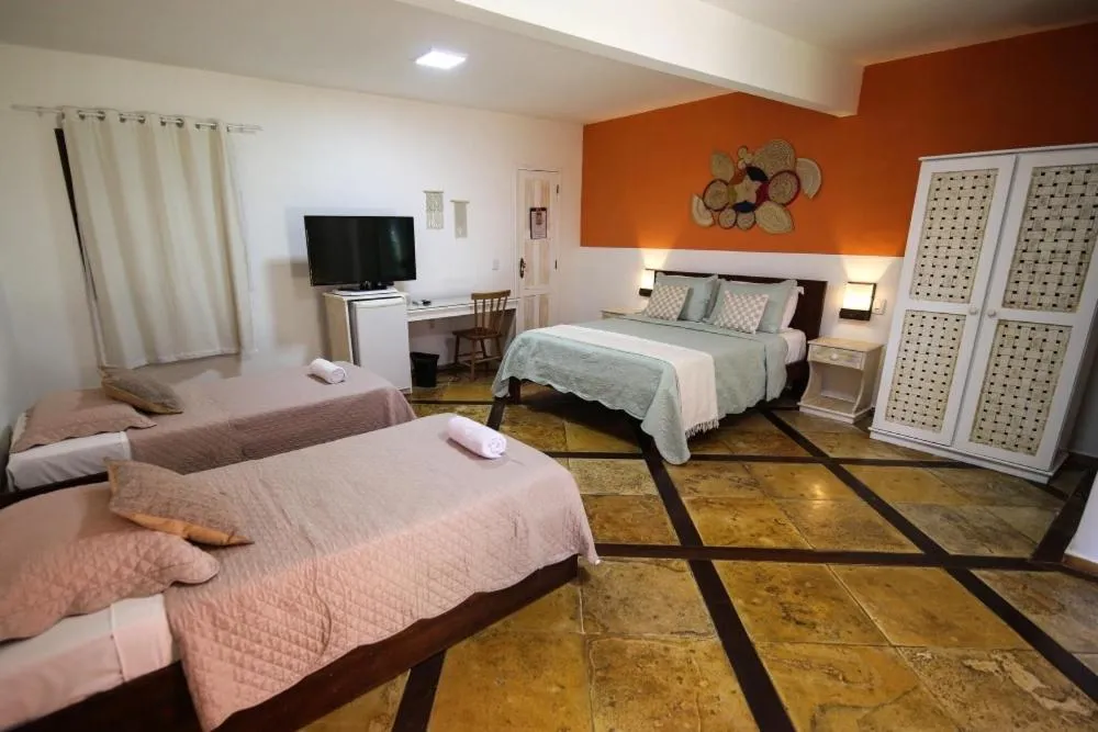 Bed in Pousada Tranquilandia Village