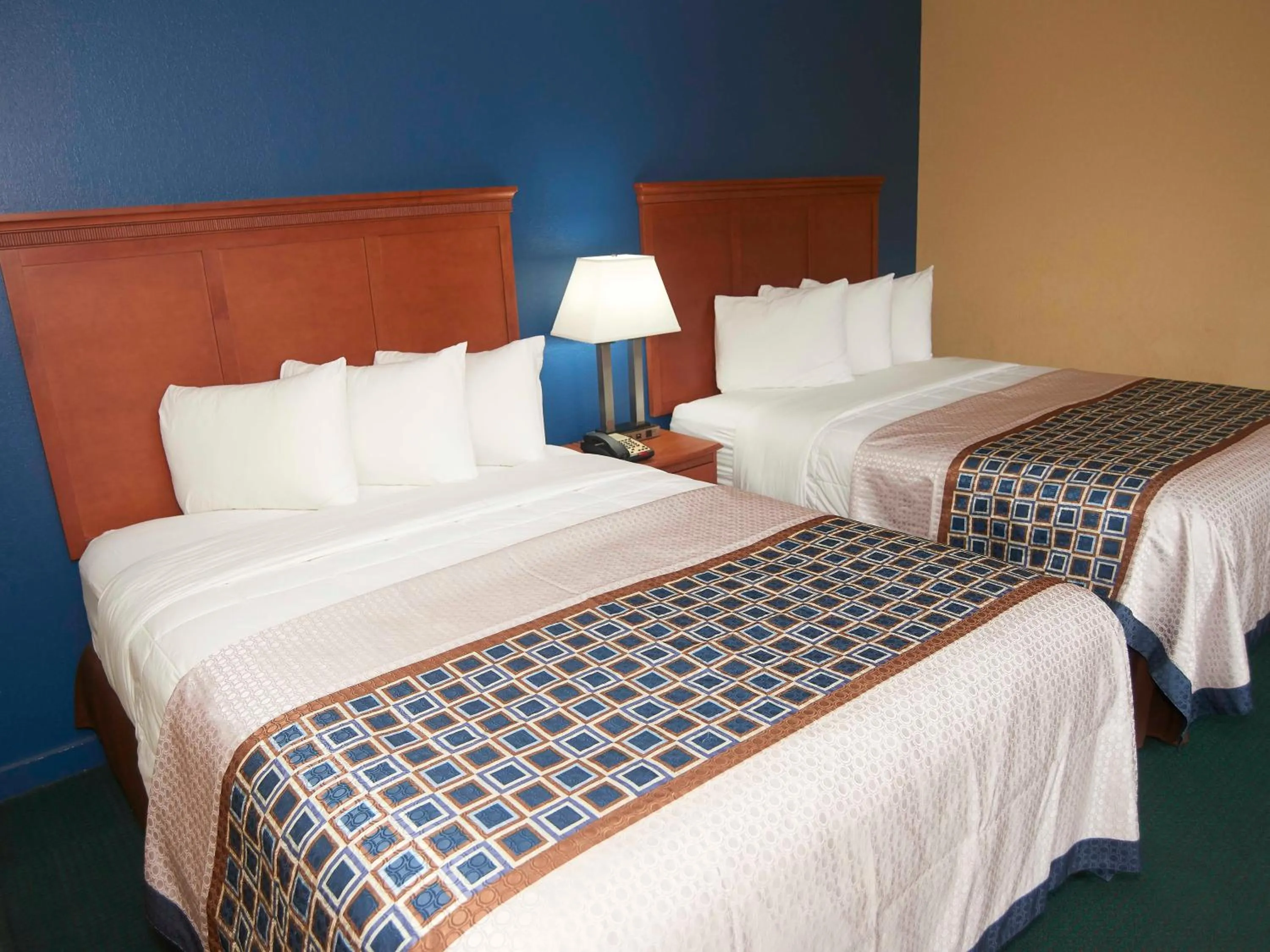 Bed in Swiss Chalets Village Inn