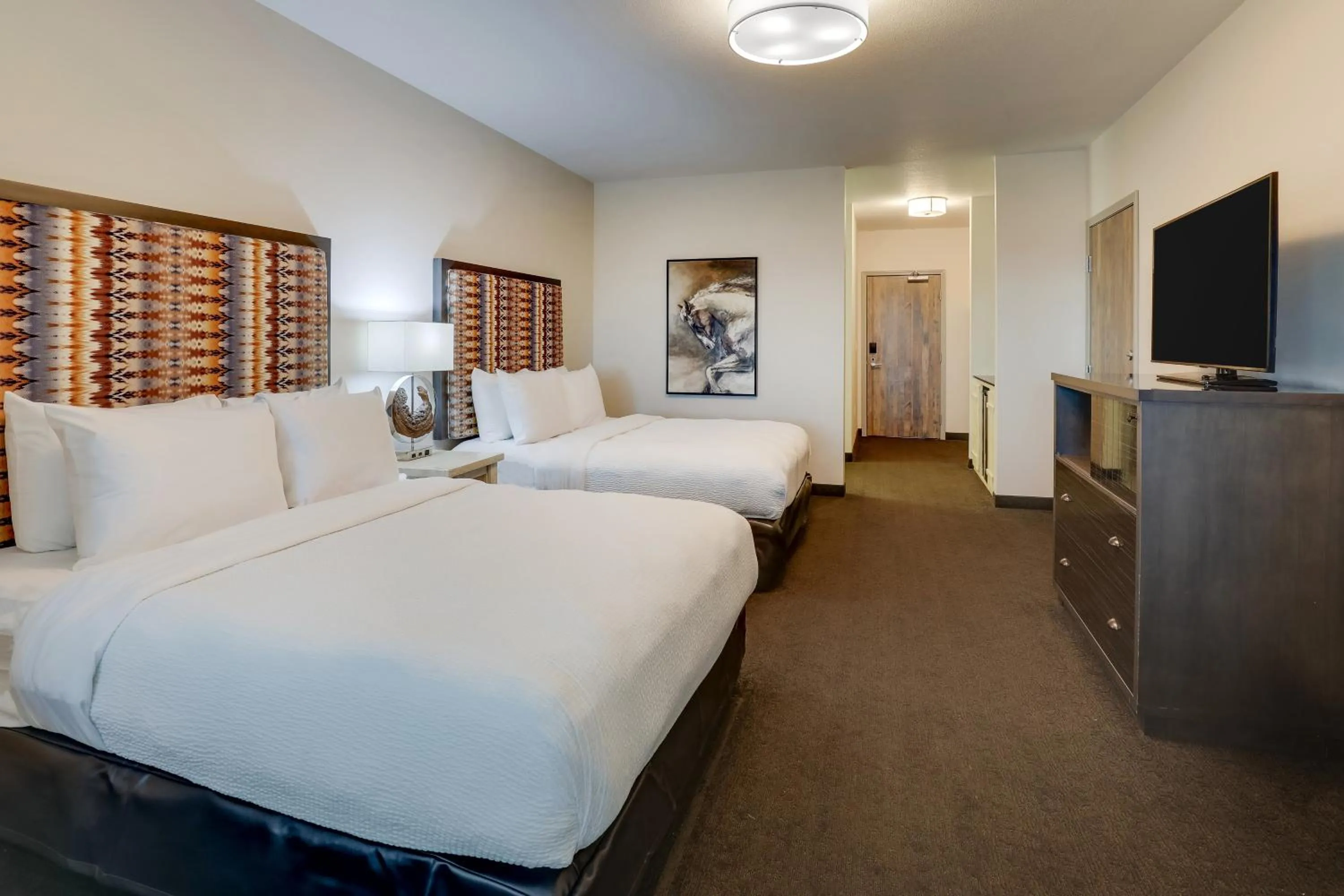 Bed in Stoney Creek Hotel Tulsa - Broken Arrow