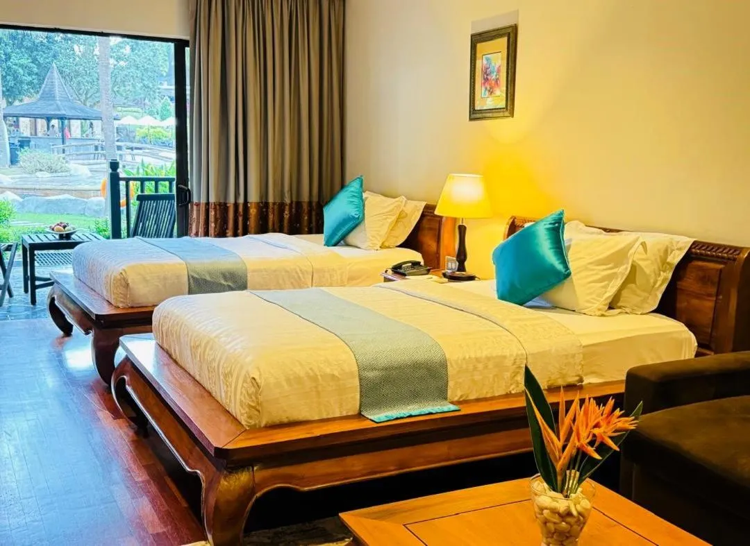 Bed in Cyberview Resort & Spa