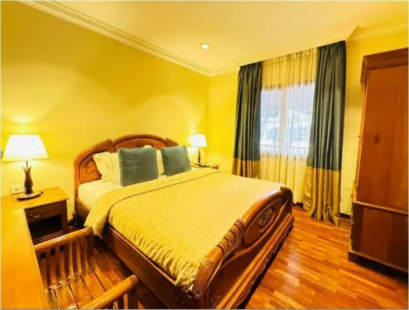 Bed in Cyberview Resort & Spa