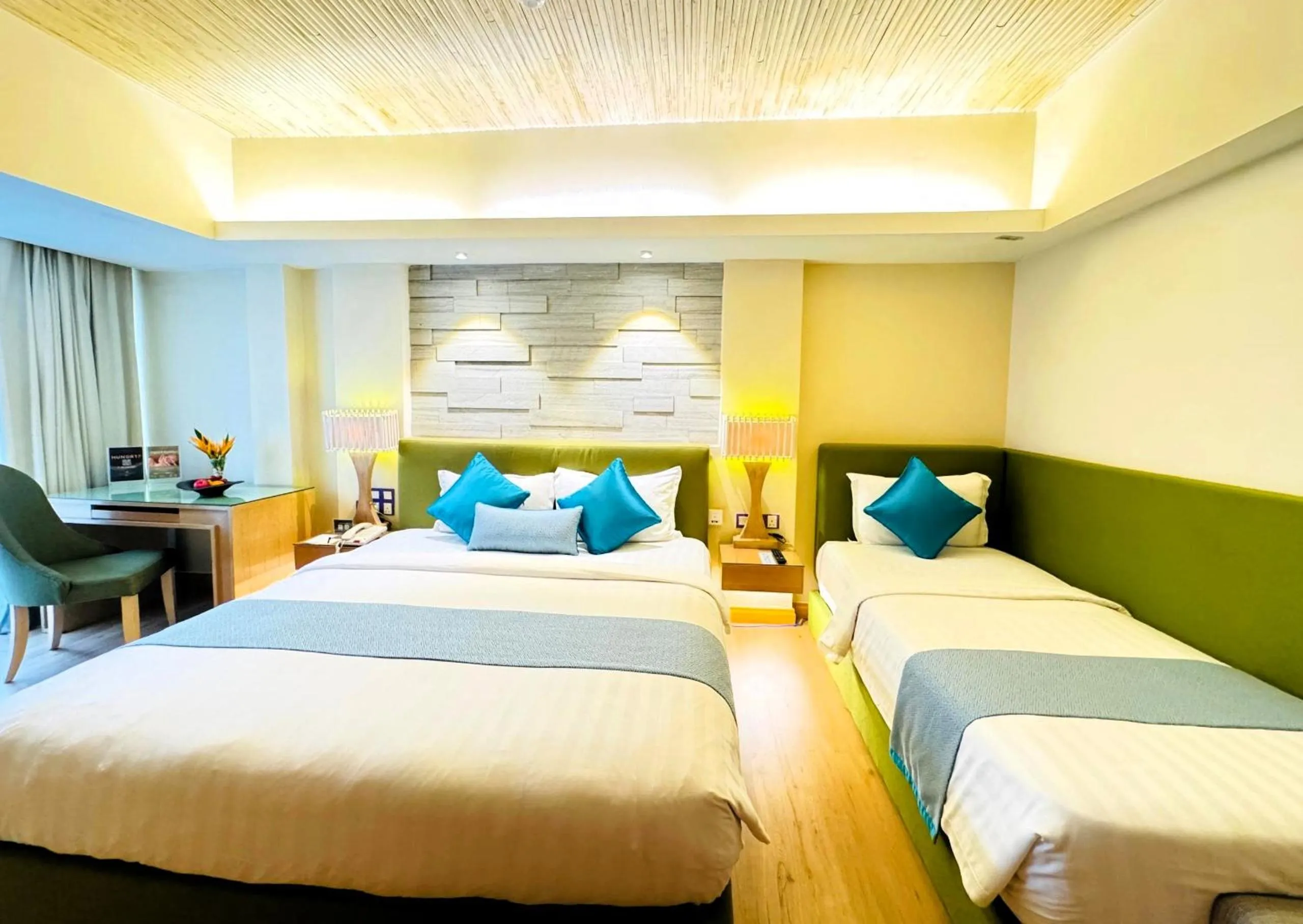 Bed in Cyberview Resort & Spa