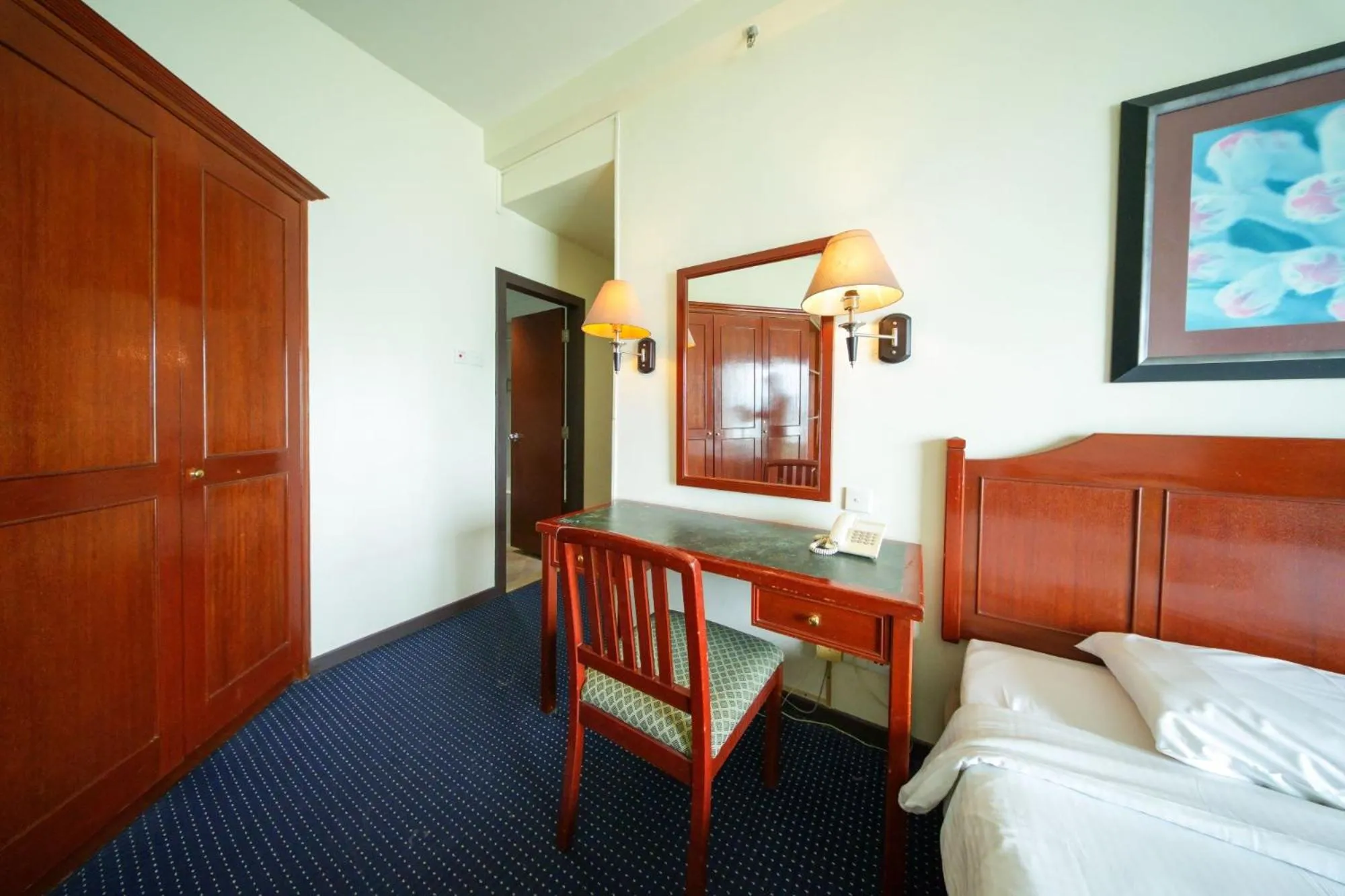 Bedroom in Rainbow Paradise Beach Resort