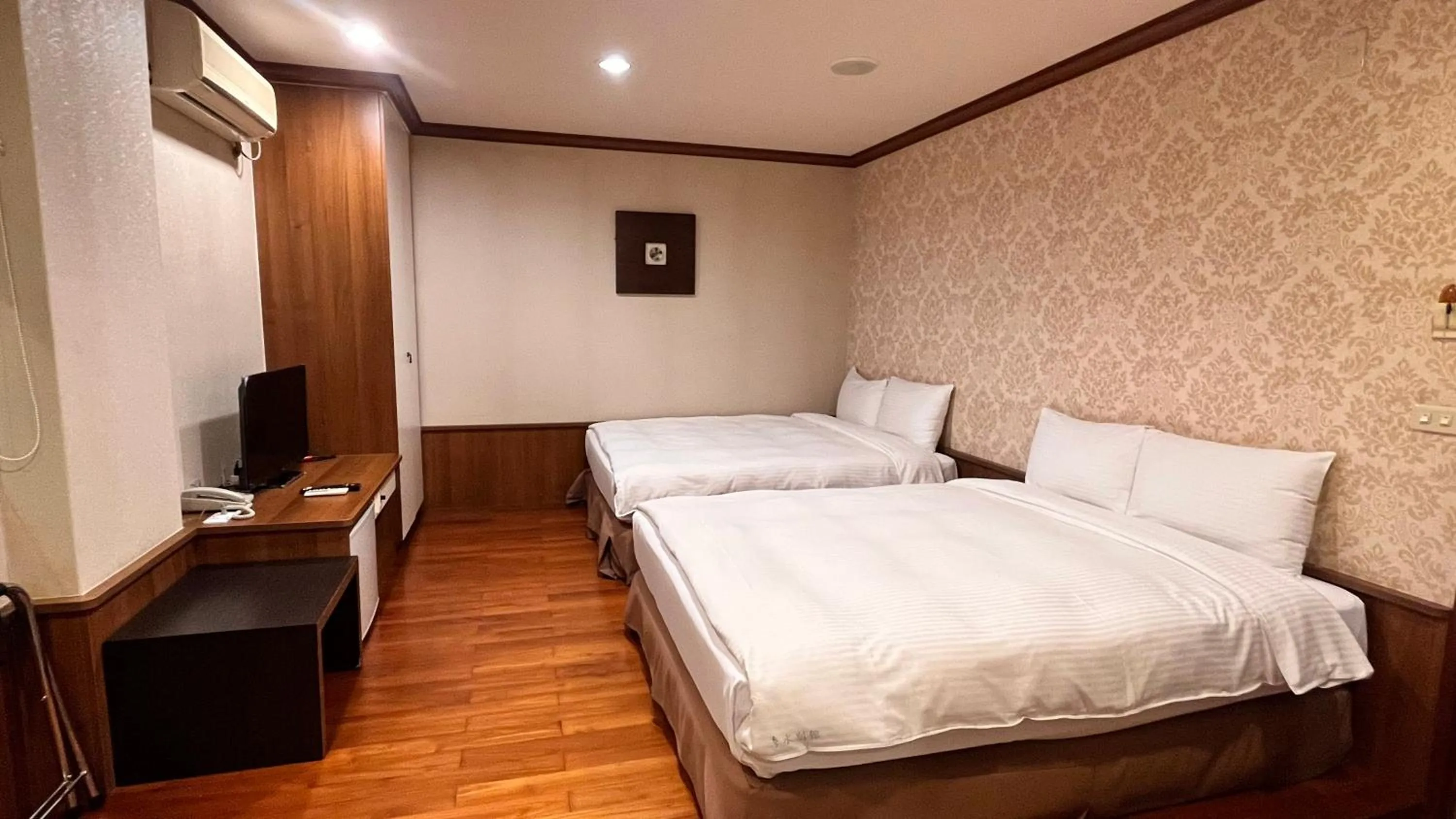 Bed in Xiu Shui Hotel