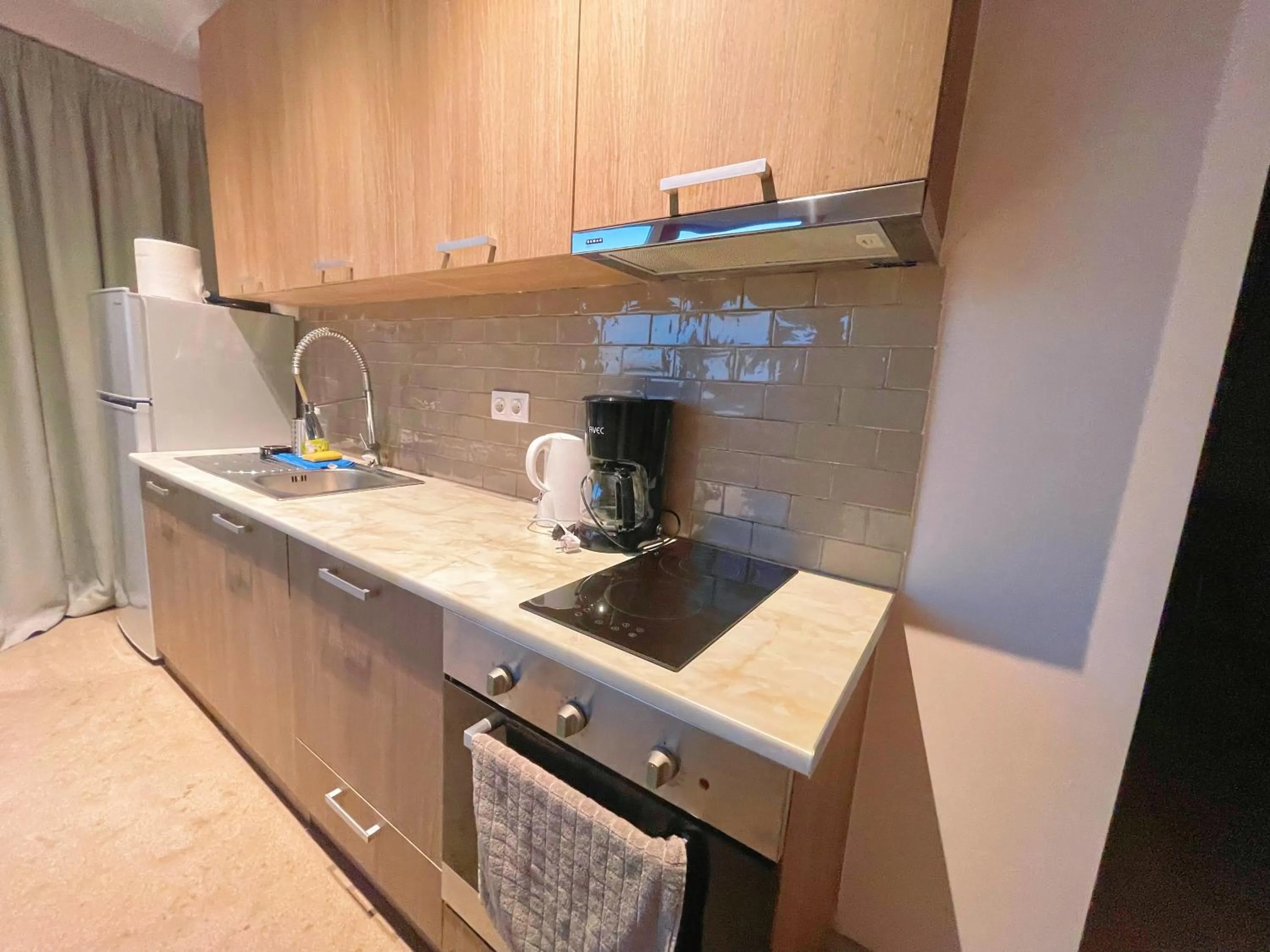 Kitchen or kitchenette in WSD Baia Acropolis Hotel Apartment