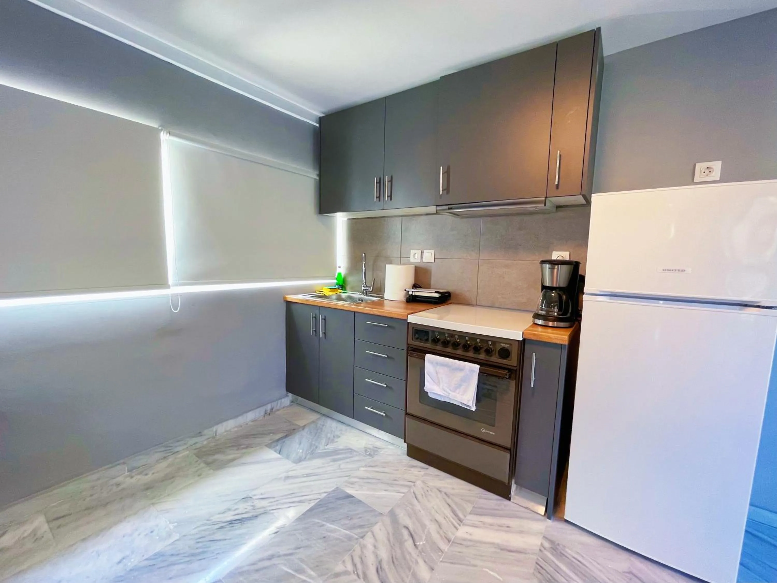 Kitchen or kitchenette in WSD Baia Acropolis Hotel Apartment