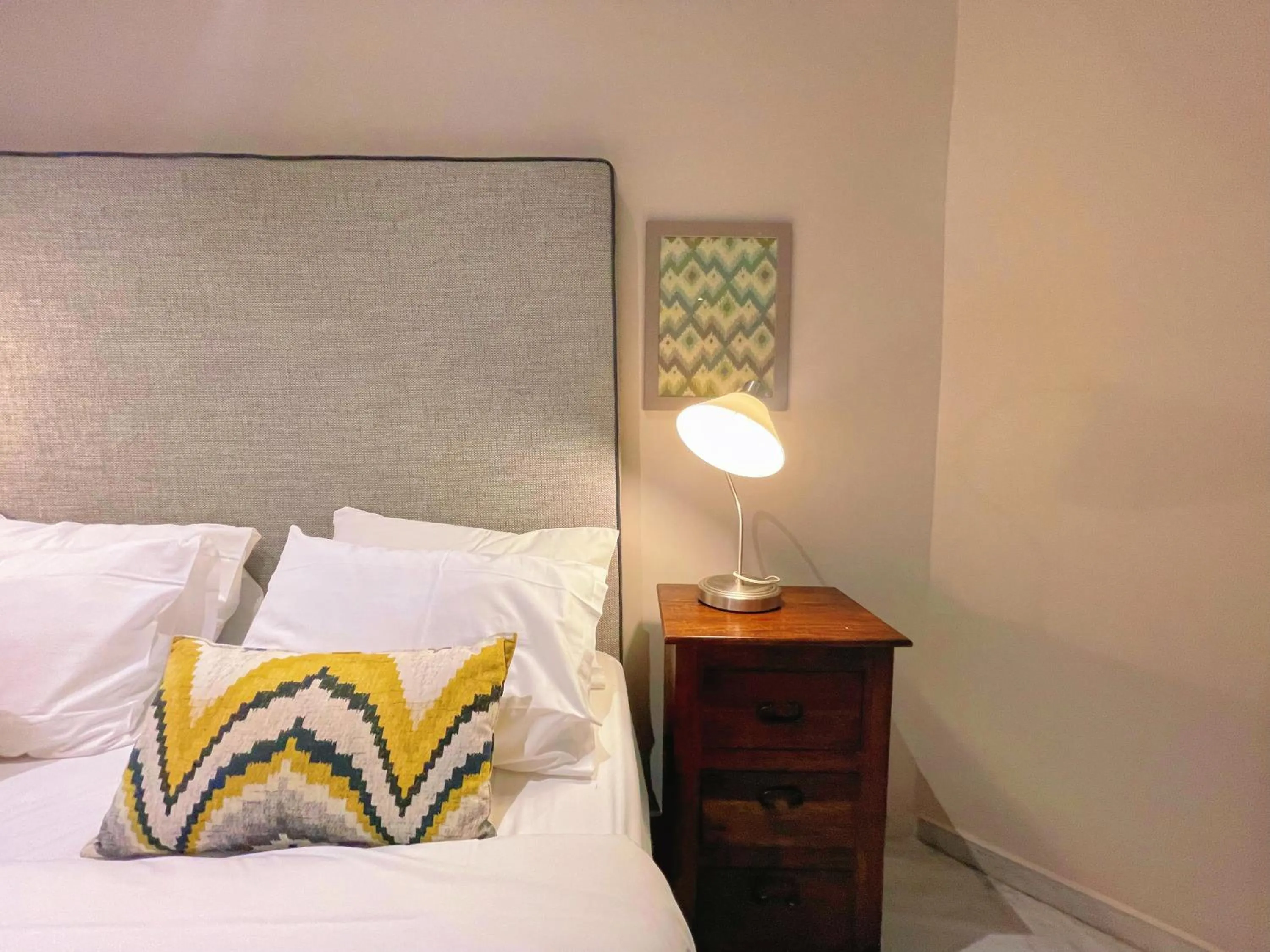 Bed in WSD Baia Acropolis Hotel Apartment