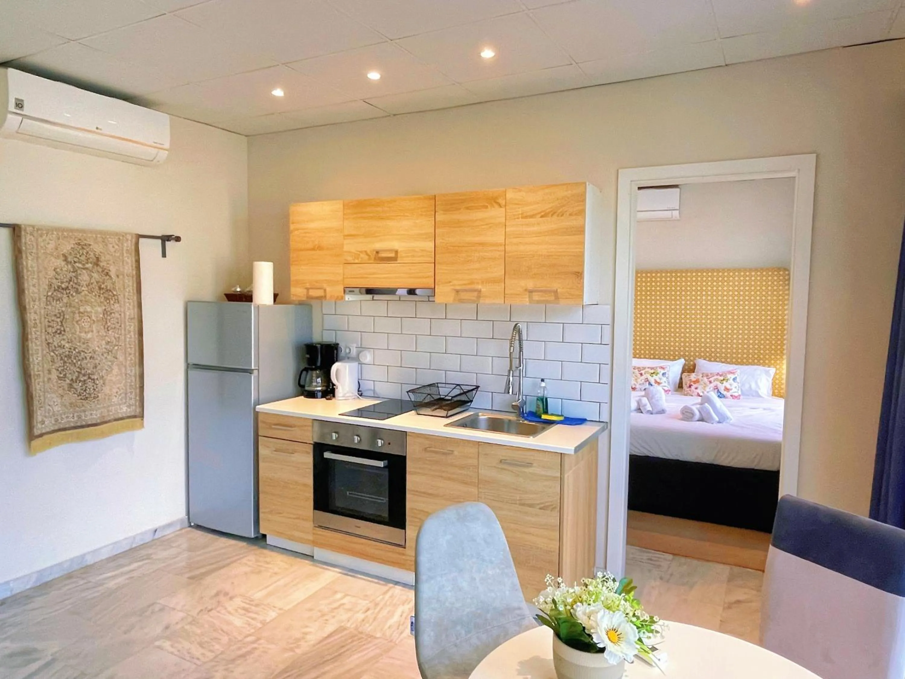 Kitchen or kitchenette in WSD Baia Acropolis Hotel Apartment