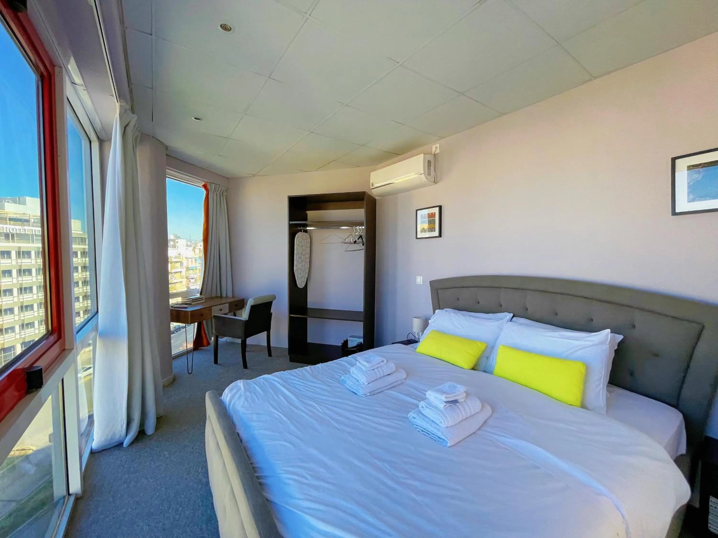 Bed in WSD Baia Acropolis Hotel Apartment