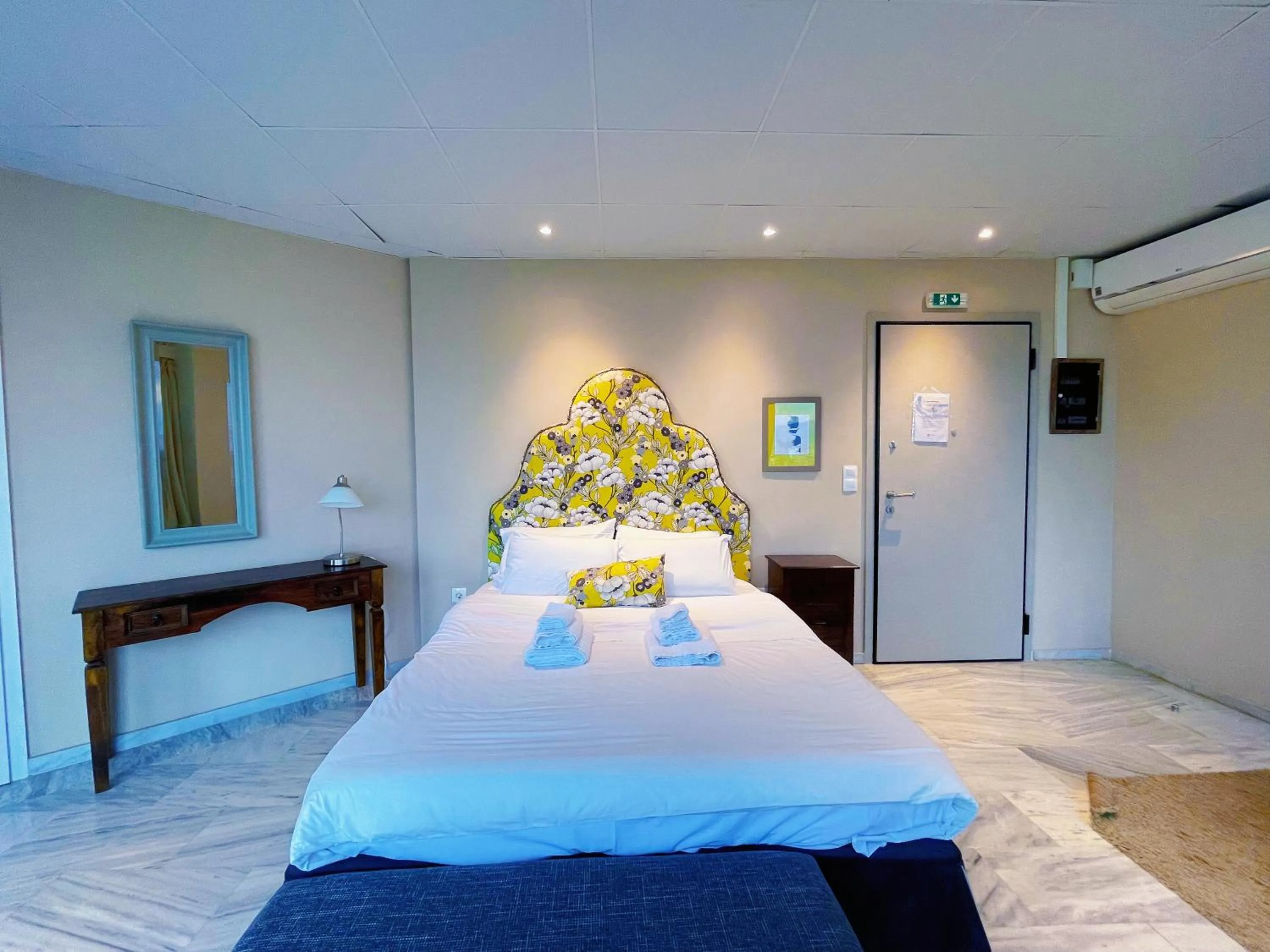 Bed in WSD Baia Acropolis Hotel Apartment