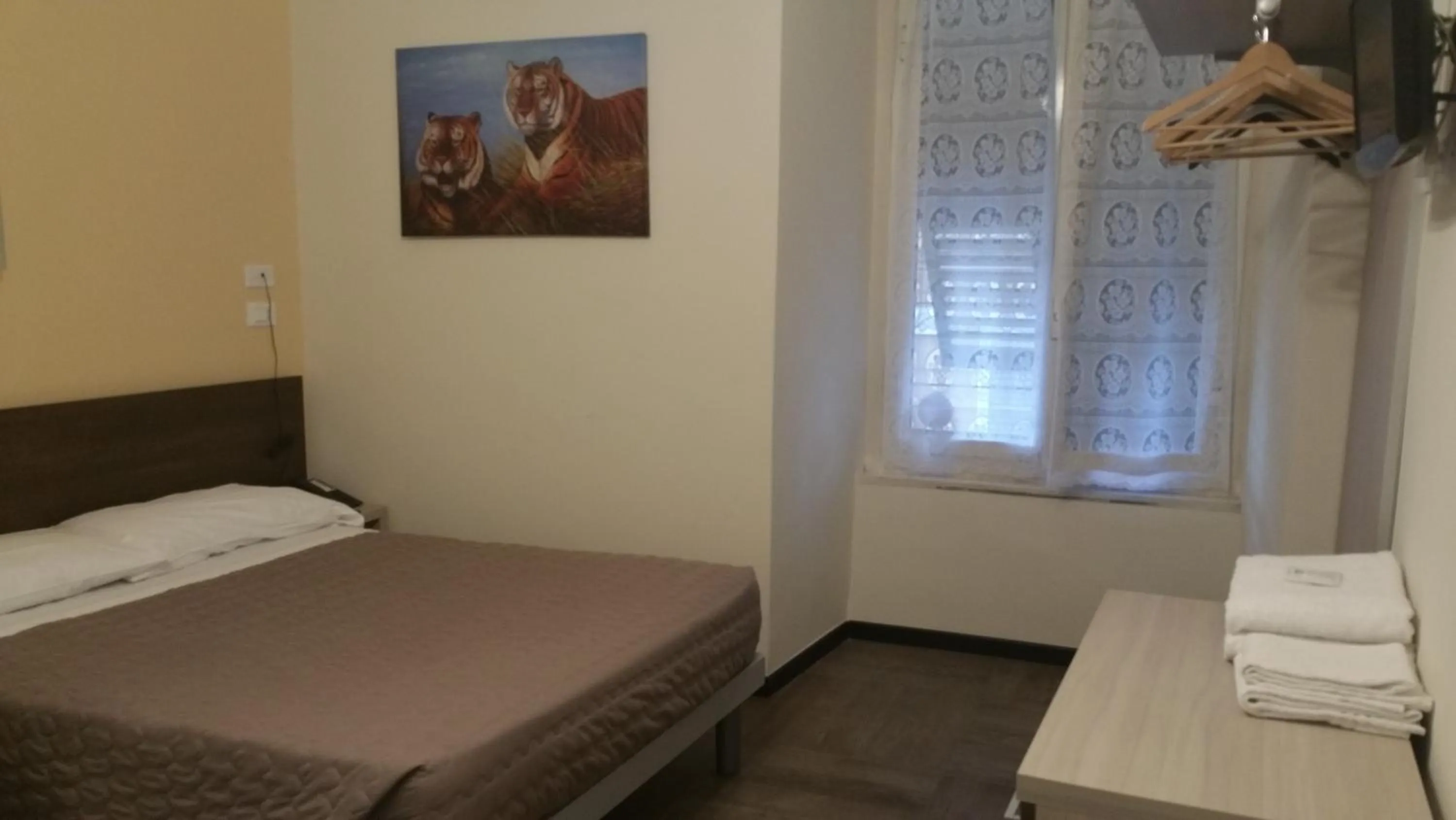 Bed in Hotel Tommaseo