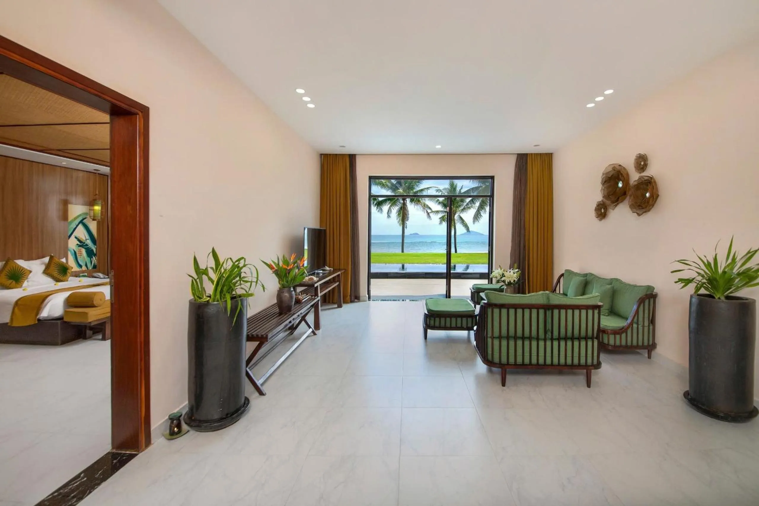 Living room, Bed in Palm Garden Beach Resort & Spa