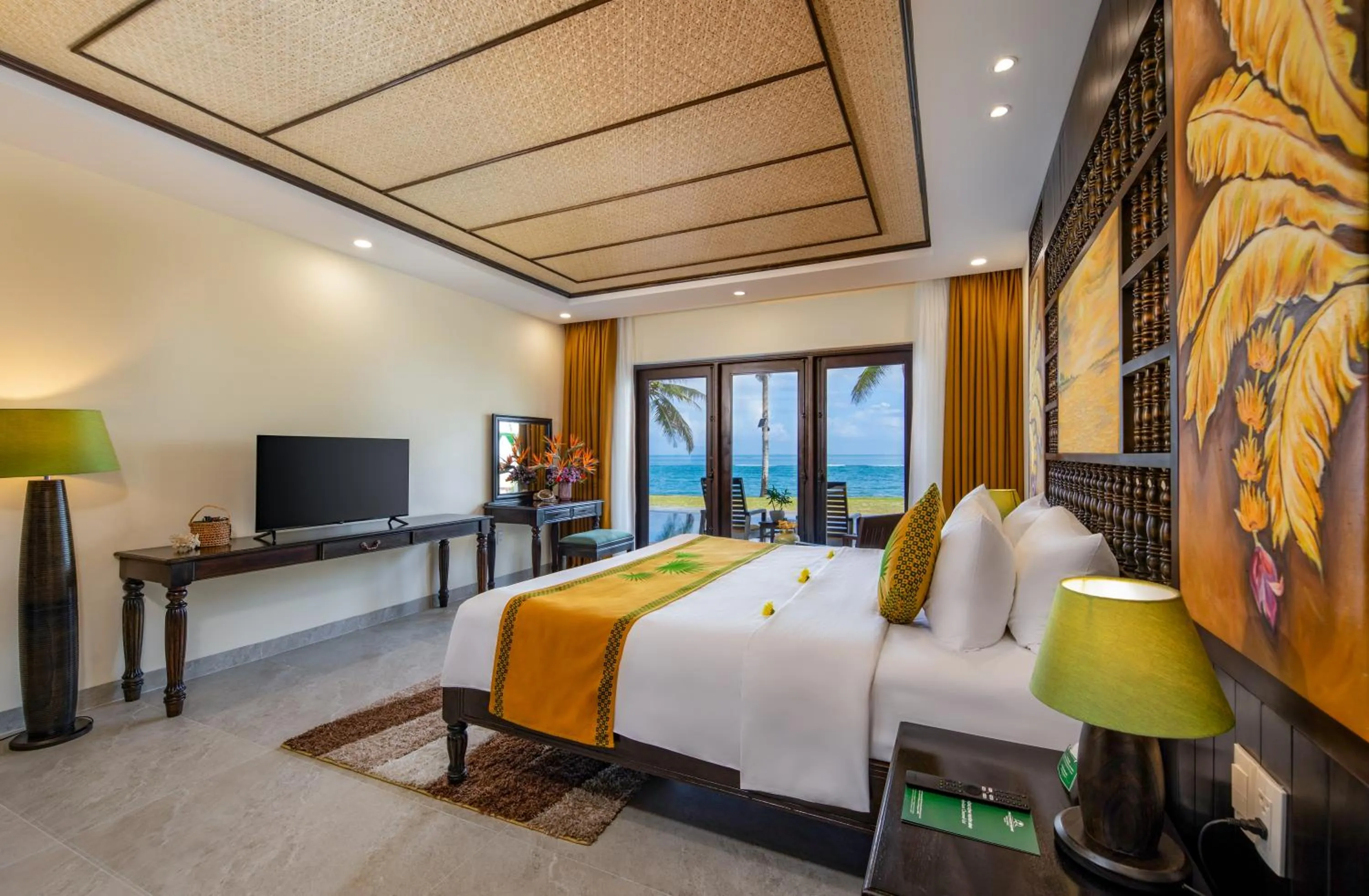 Bed in Palm Garden Beach Resort & Spa