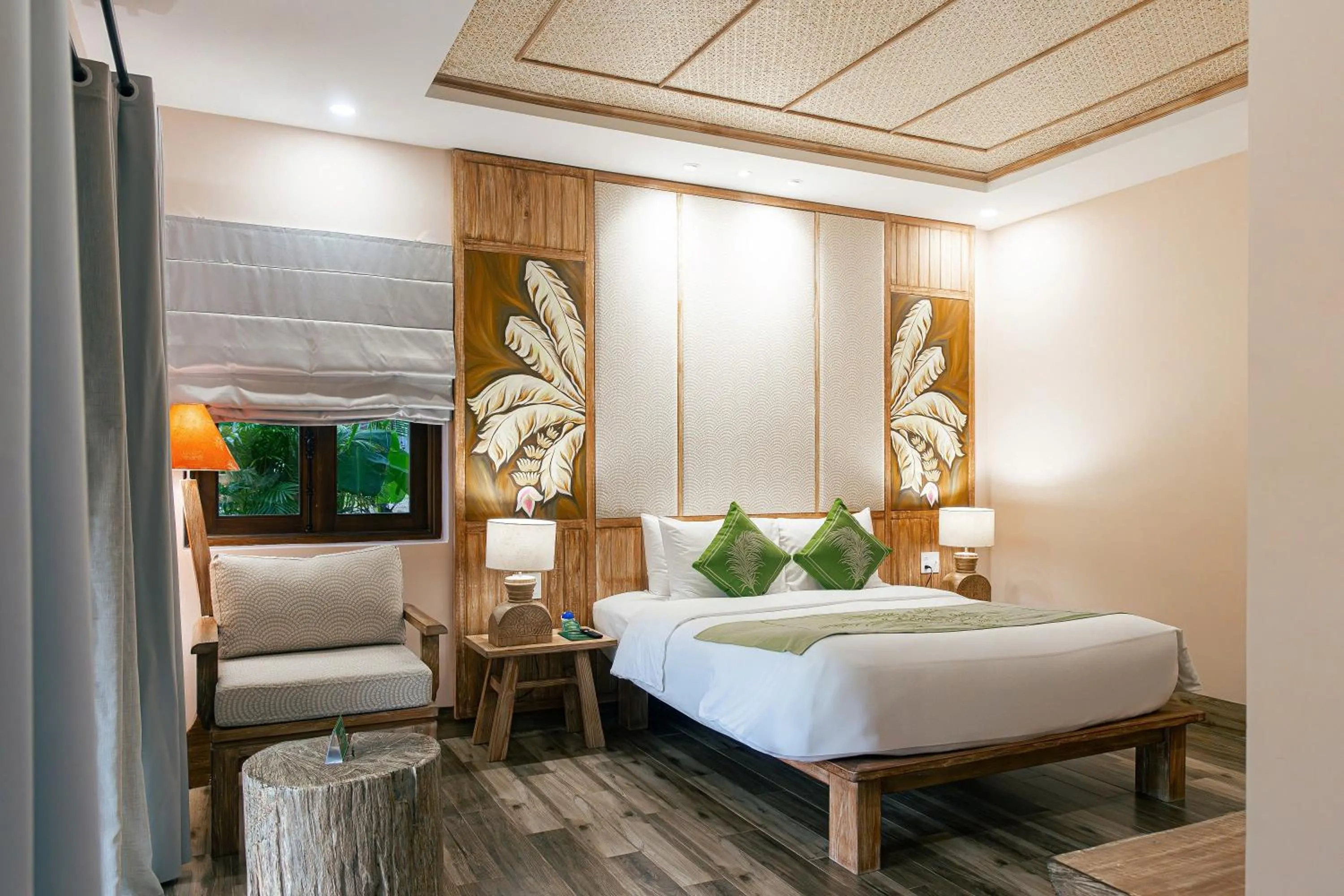 Bed in Palm Garden Beach Resort & Spa