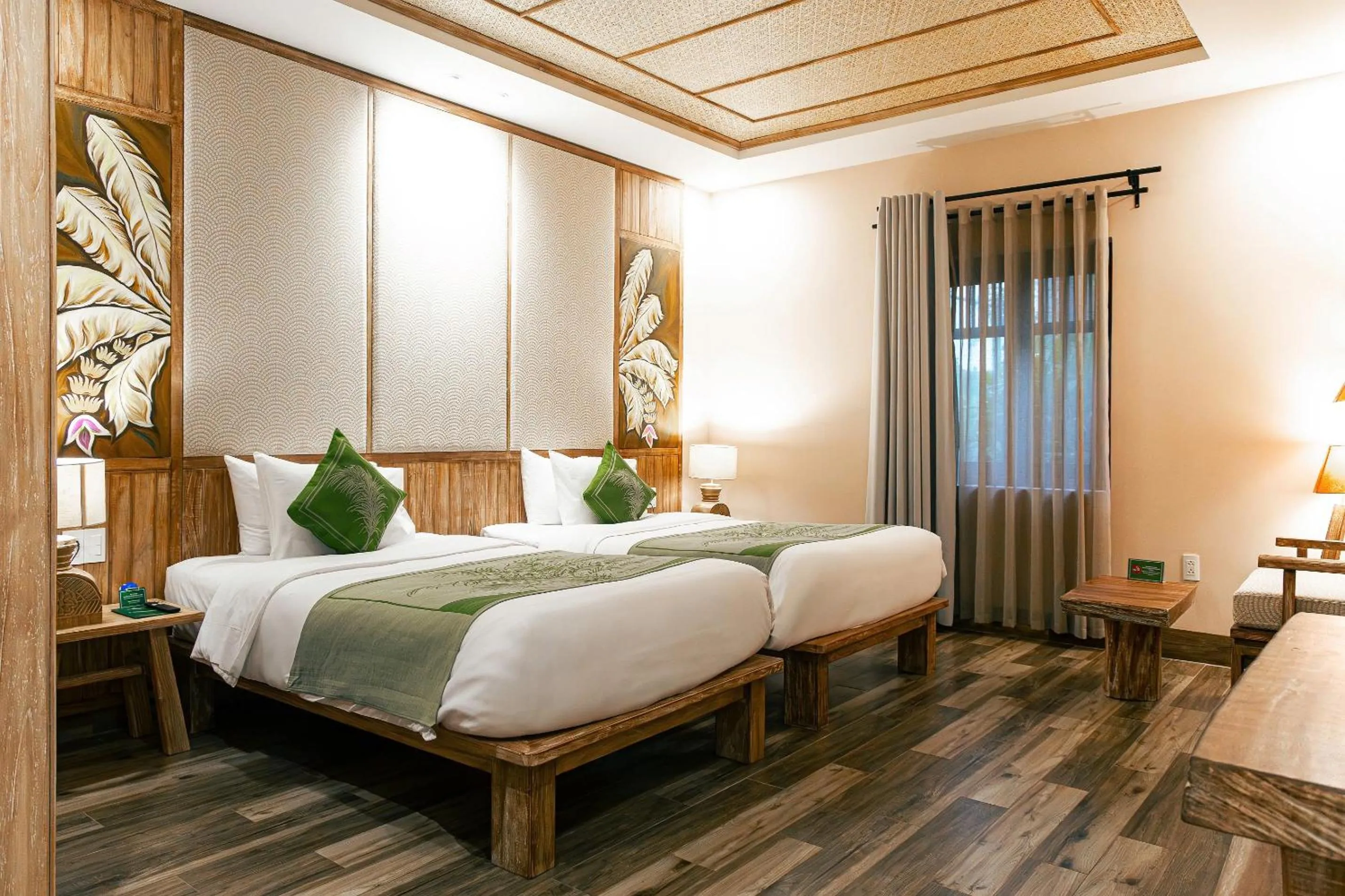 Bed in Palm Garden Beach Resort & Spa