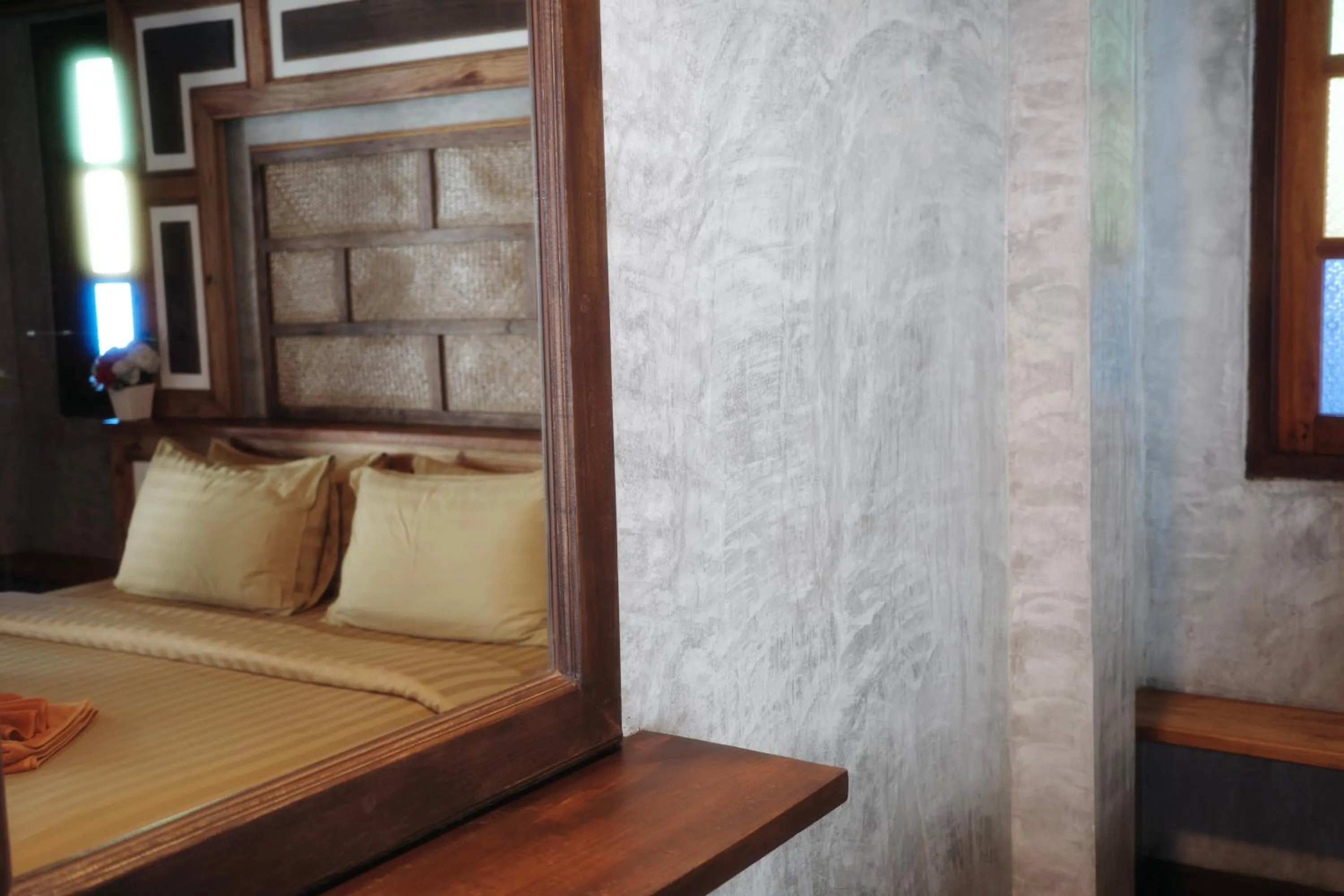 Bed in Phi Phi Relax Beach Resort