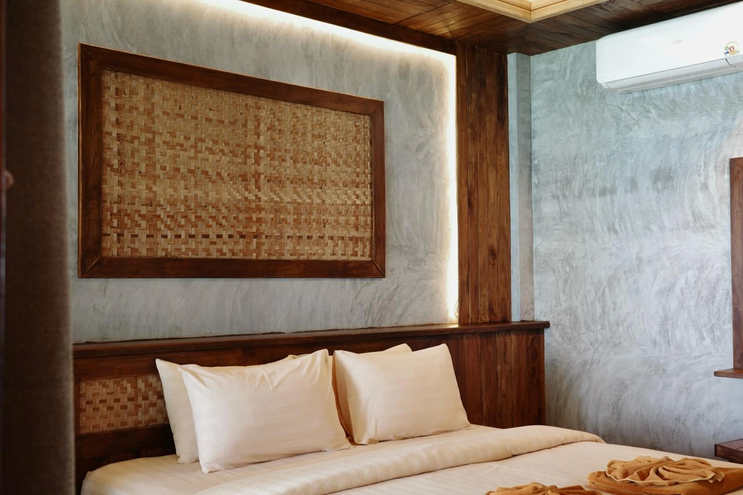 Bed in Phi Phi Relax Beach Resort