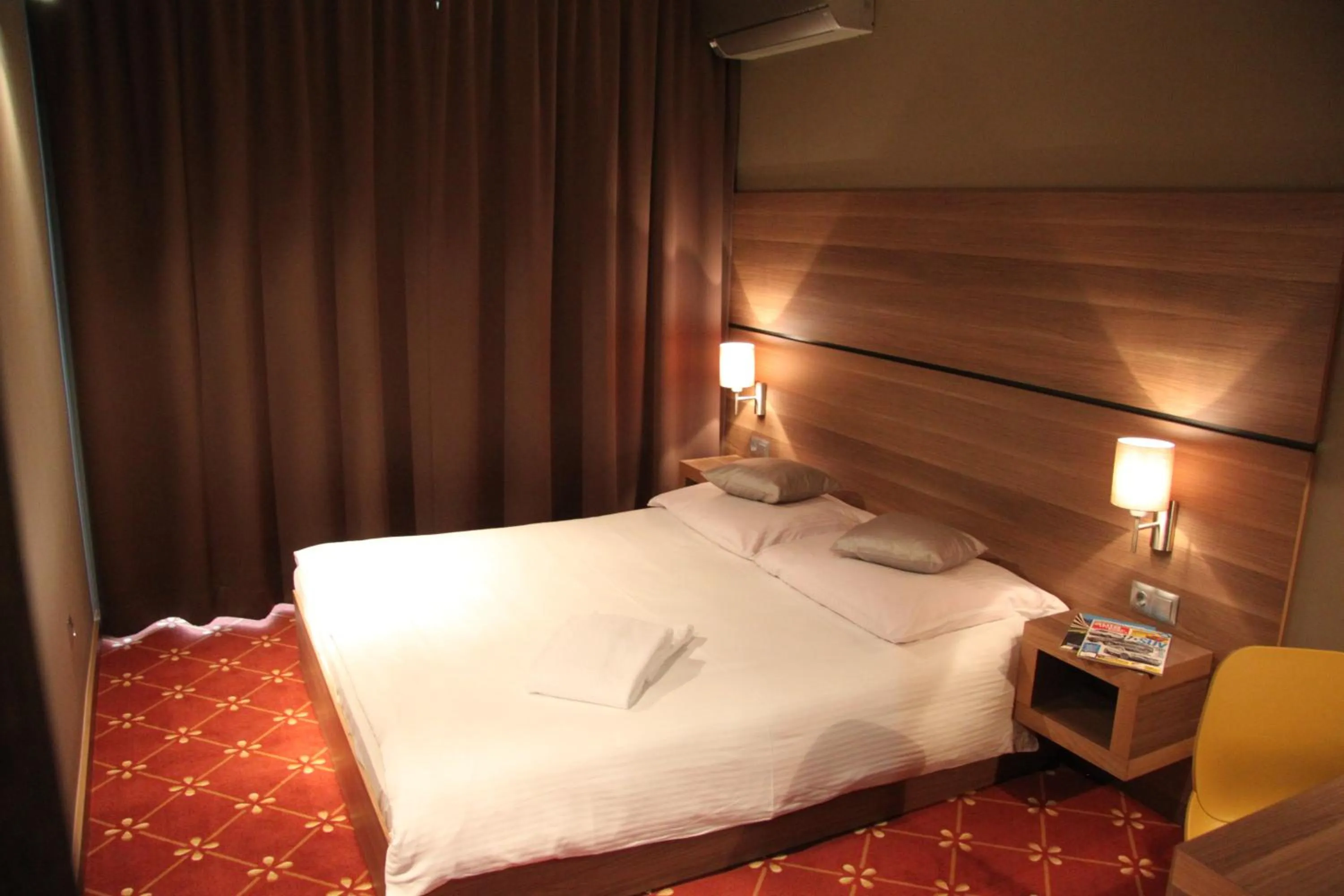 Bed in Hotel Dunajec