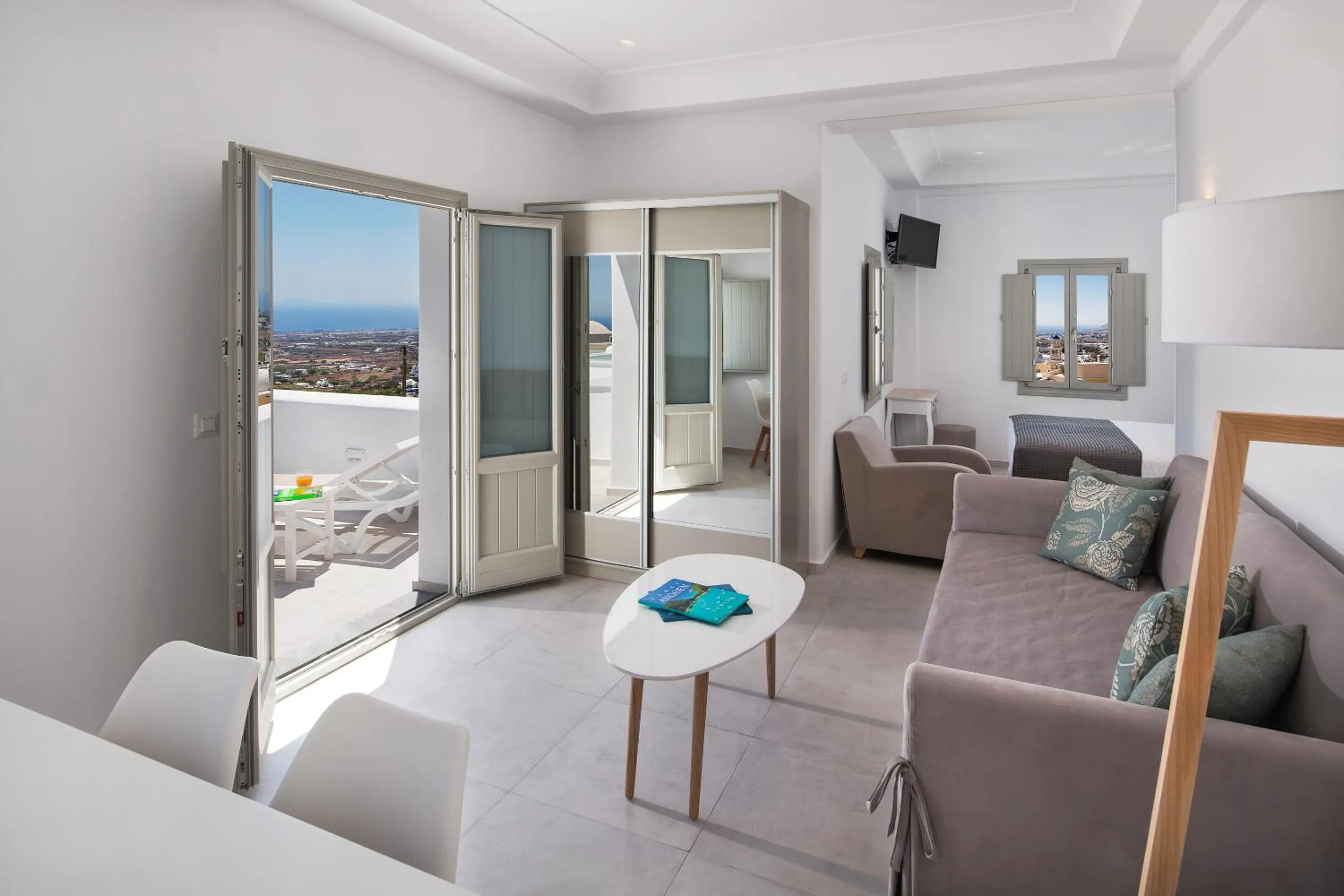 Living room, Bed in Altemar Suites