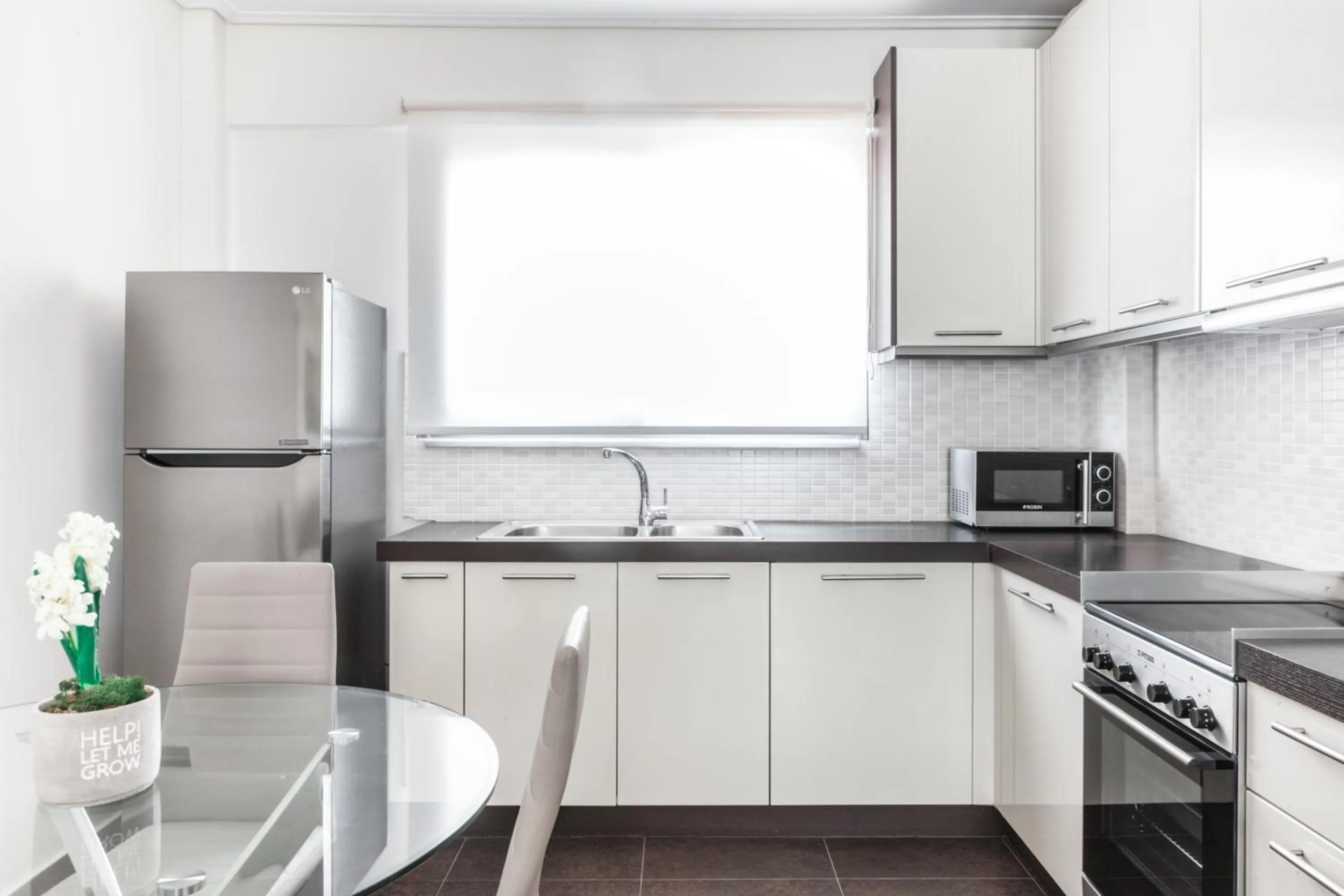 Kitchen or kitchenette in DN Sea Apartments