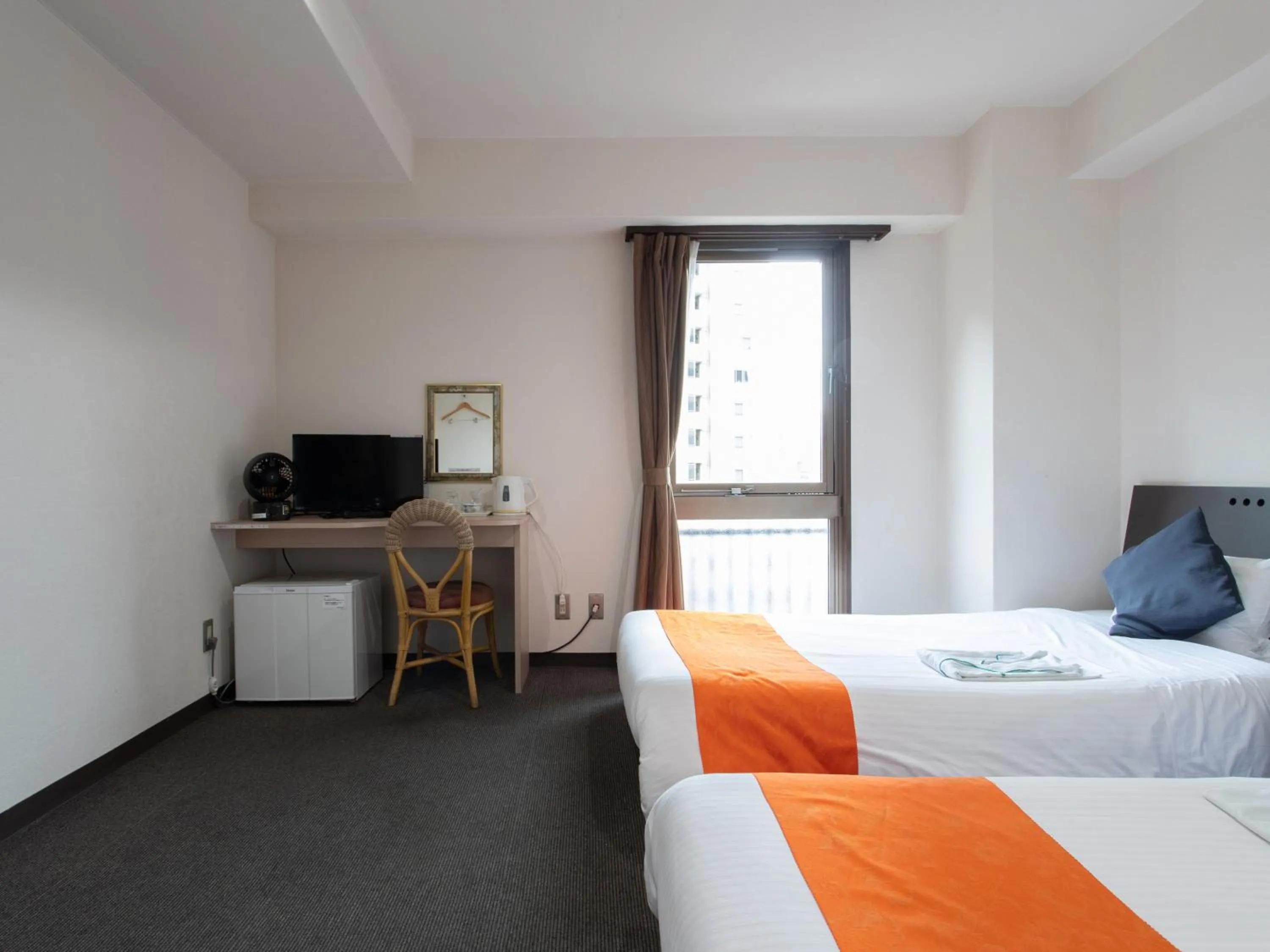 Bed in Tabist Sasebo Palace Hotel