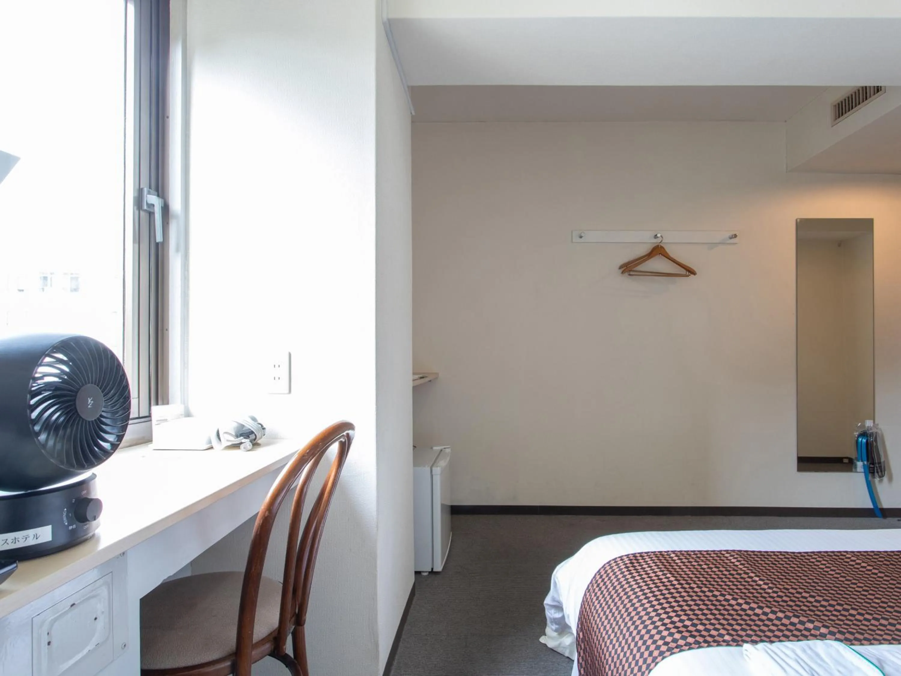 Bed in Tabist Sasebo Palace Hotel