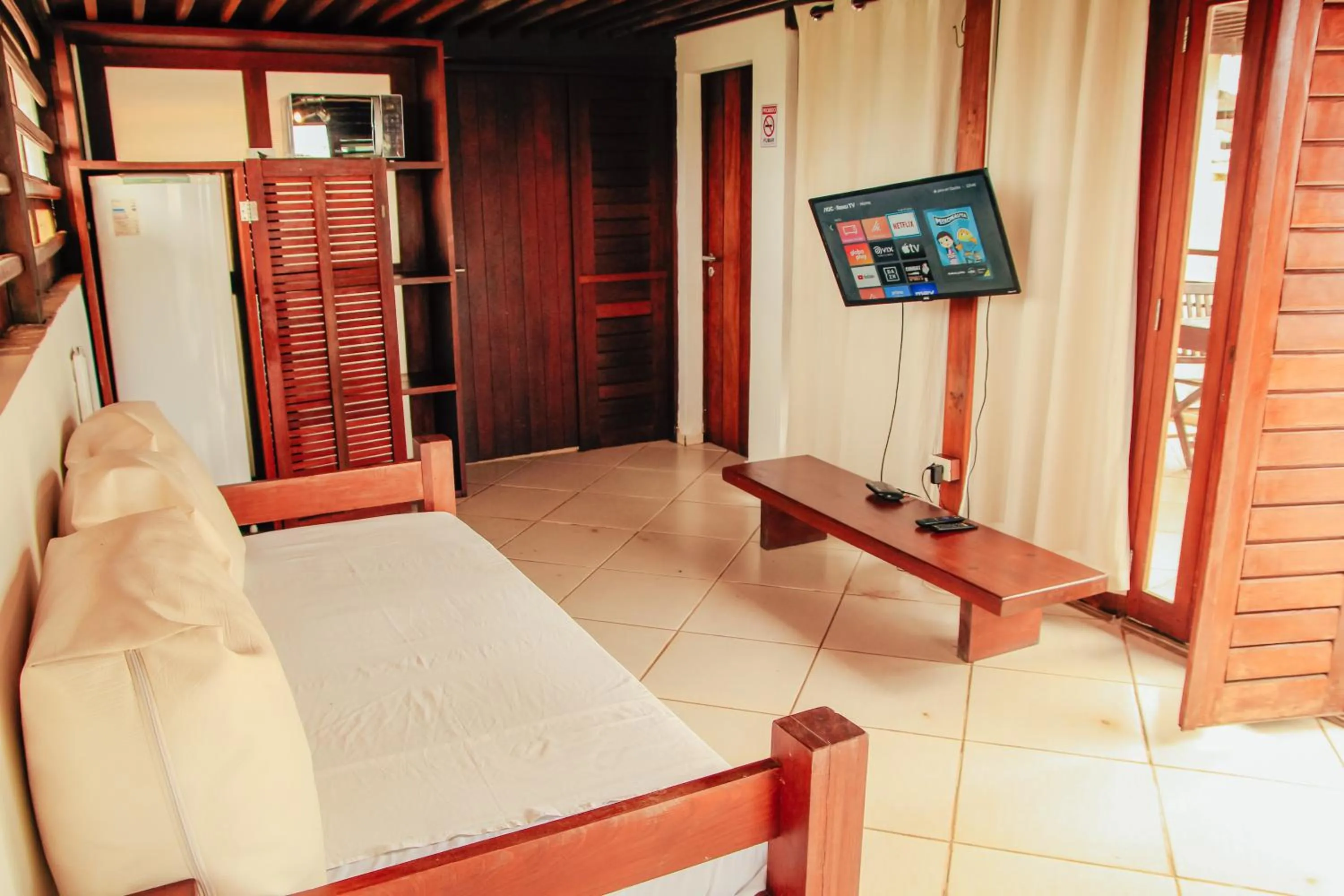 Communal lounge/ TV room, Bed in Pipa Panorama Aparthotel