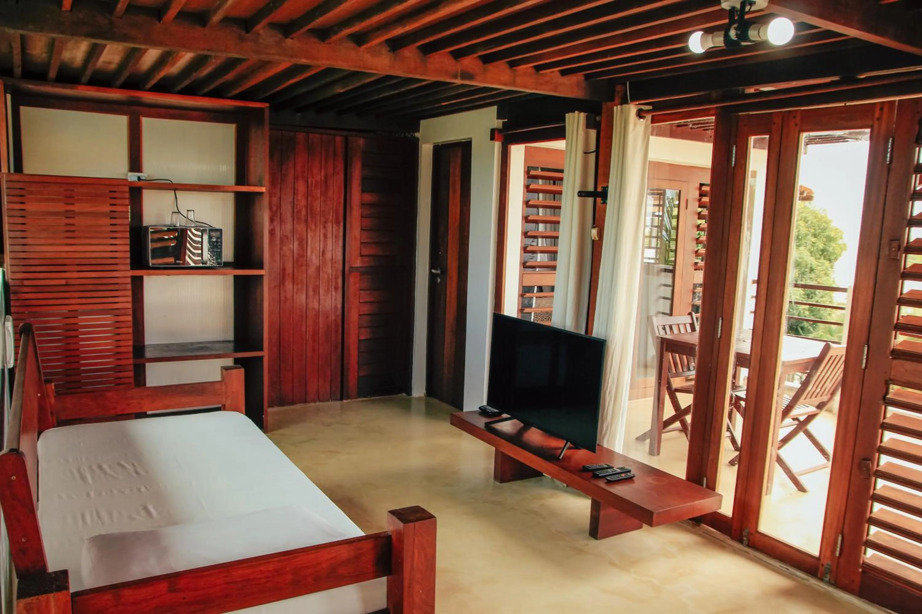 Communal lounge/ TV room, Bed in Pipa Panorama Aparthotel