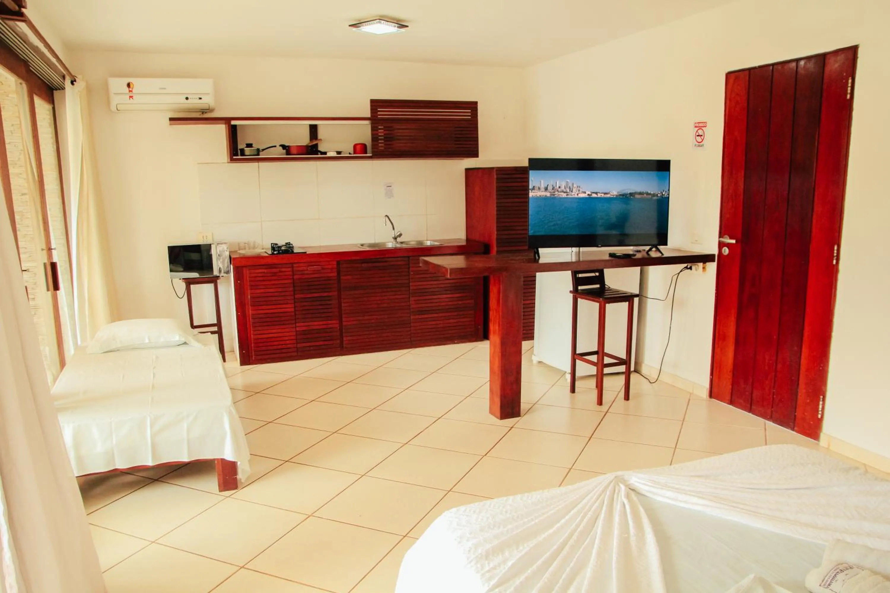 Communal lounge/ TV room, Bed in Pipa Panorama Aparthotel