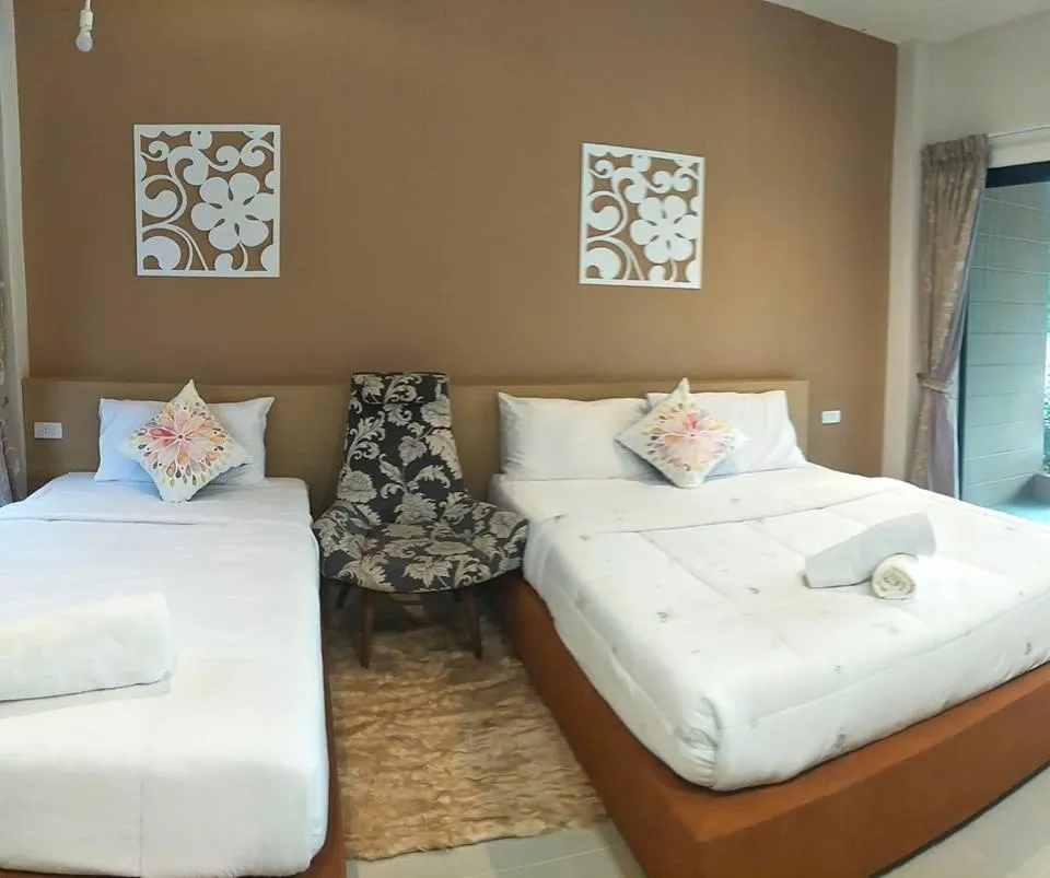 Bed in Suwi Coco Ville Resort
