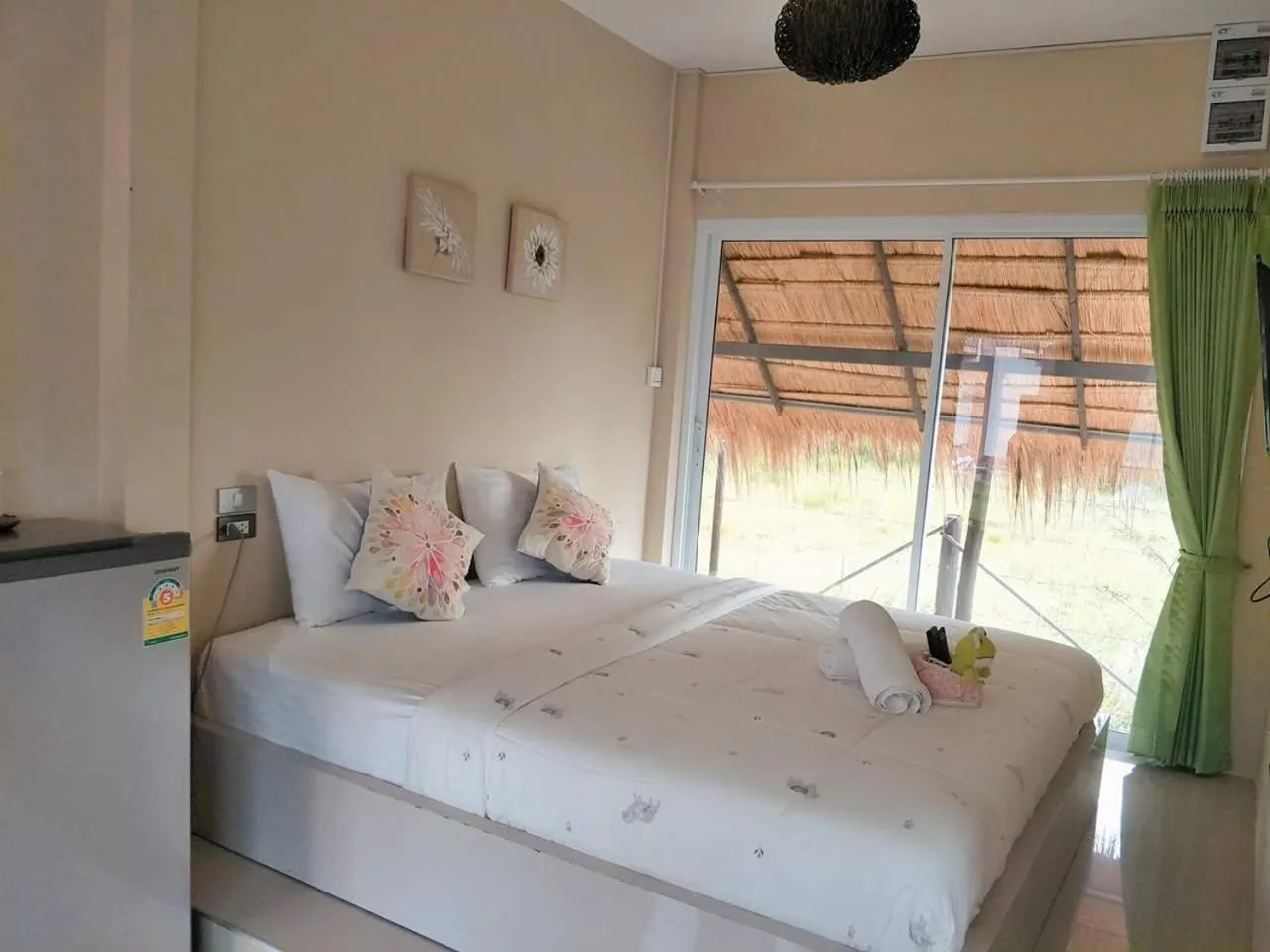 Photo of the whole room, Bed in Suwi Coco Ville Resort