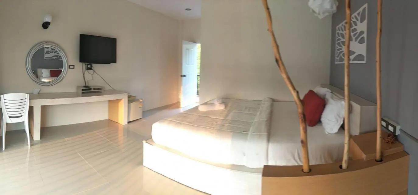 Bed in Suwi Coco Ville Resort