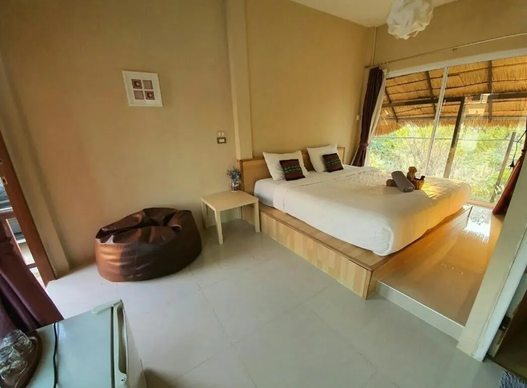 Bed in Suwi Coco Ville Resort