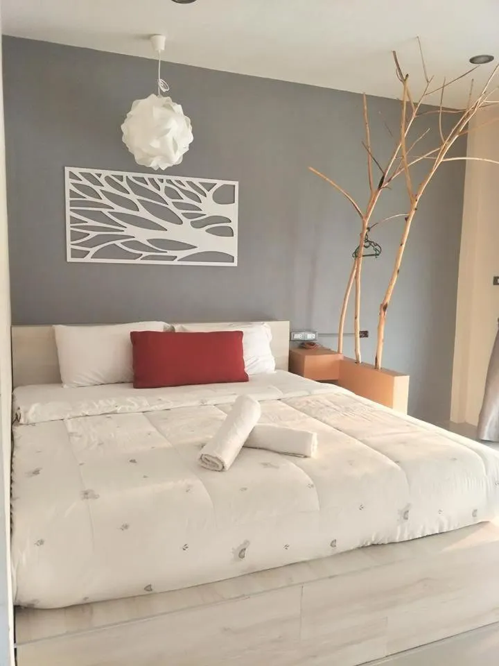 Bed in Suwi Coco Ville Resort