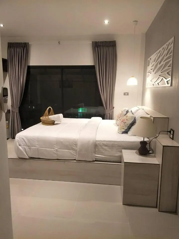 Bed in Suwi Coco Ville Resort