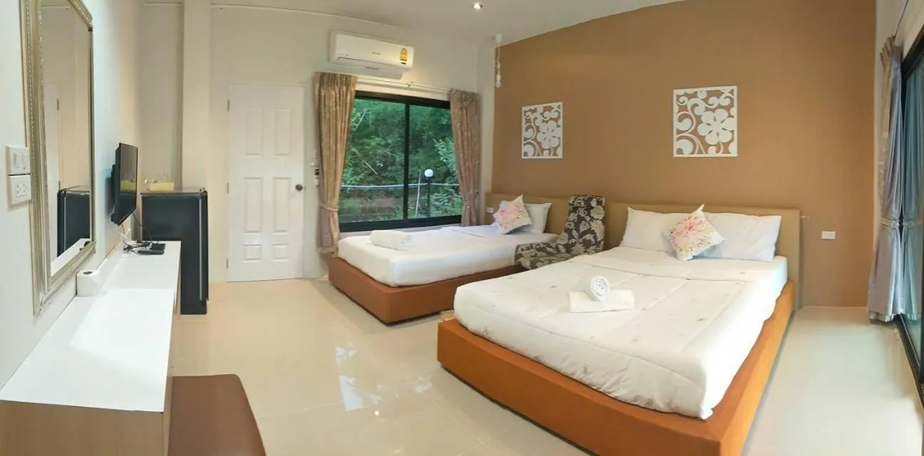Bed in Suwi Coco Ville Resort