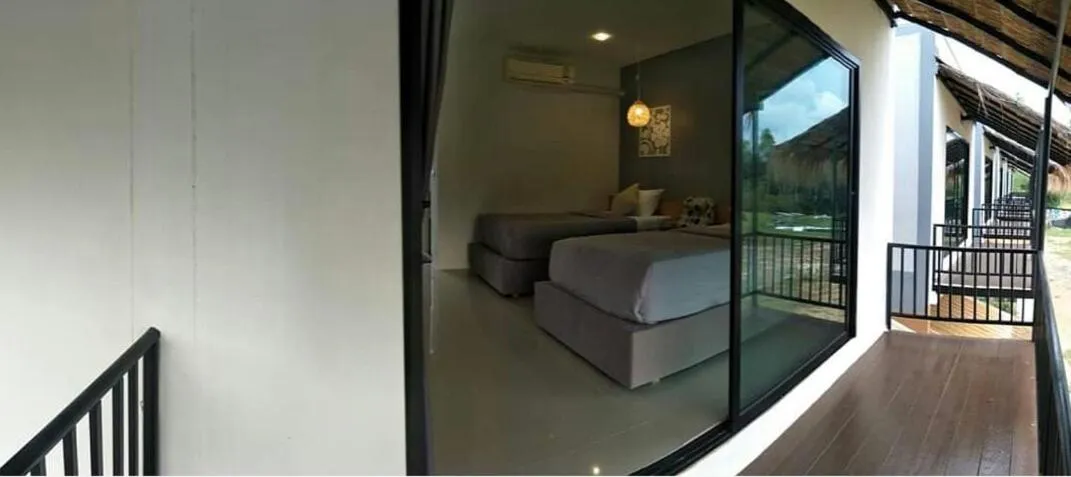 Bed in Suwi Coco Ville Resort