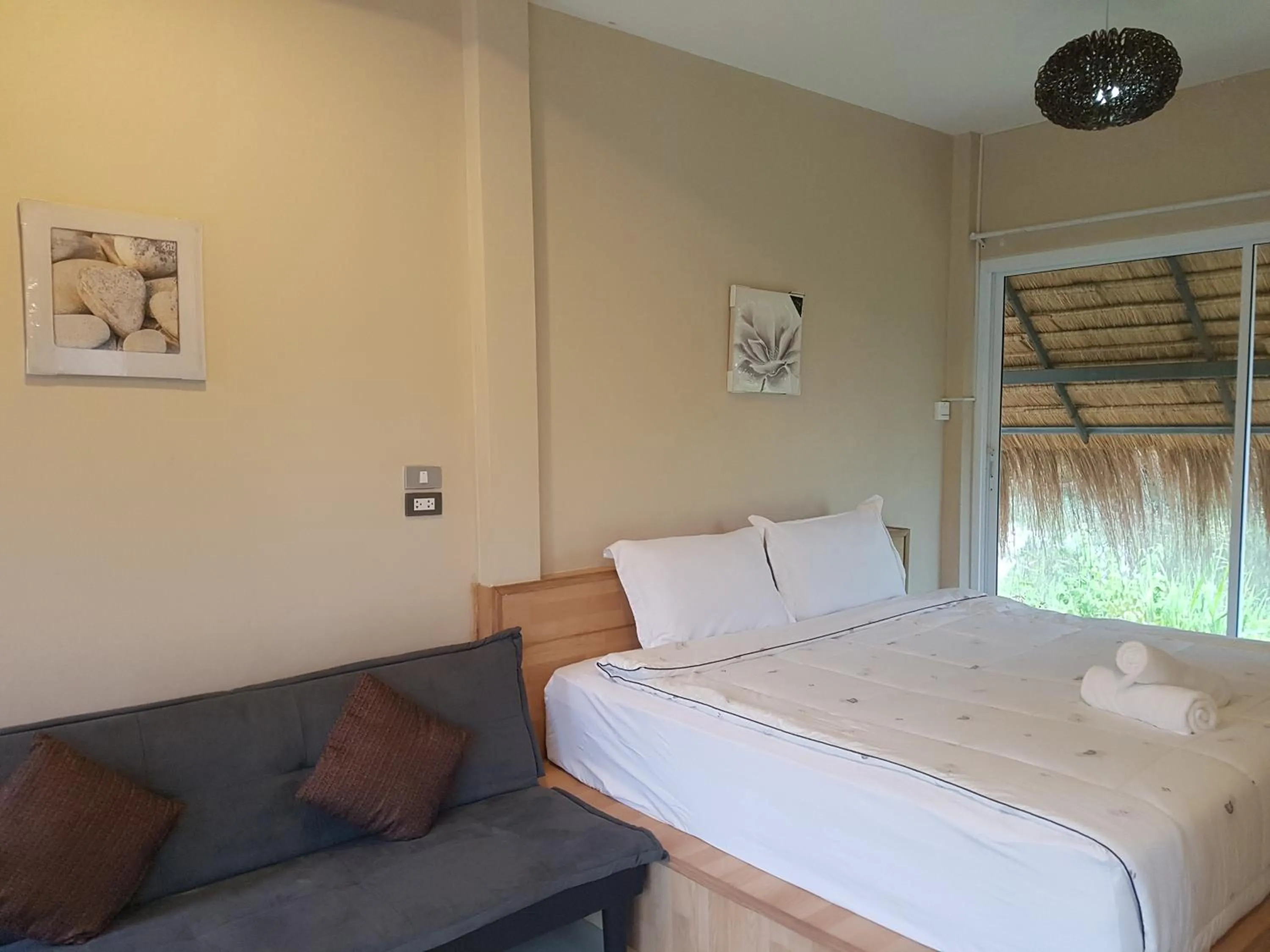 Bed in Suwi Coco Ville Resort