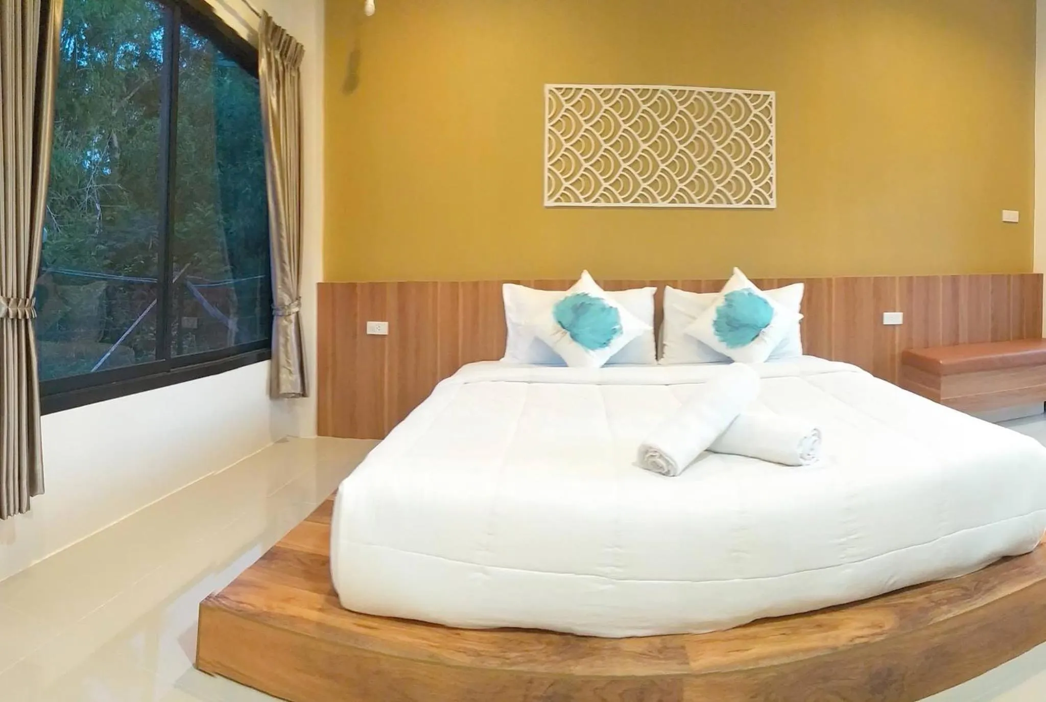 Bed in Suwi Coco Ville Resort