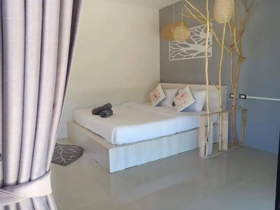 Bed in Suwi Coco Ville Resort