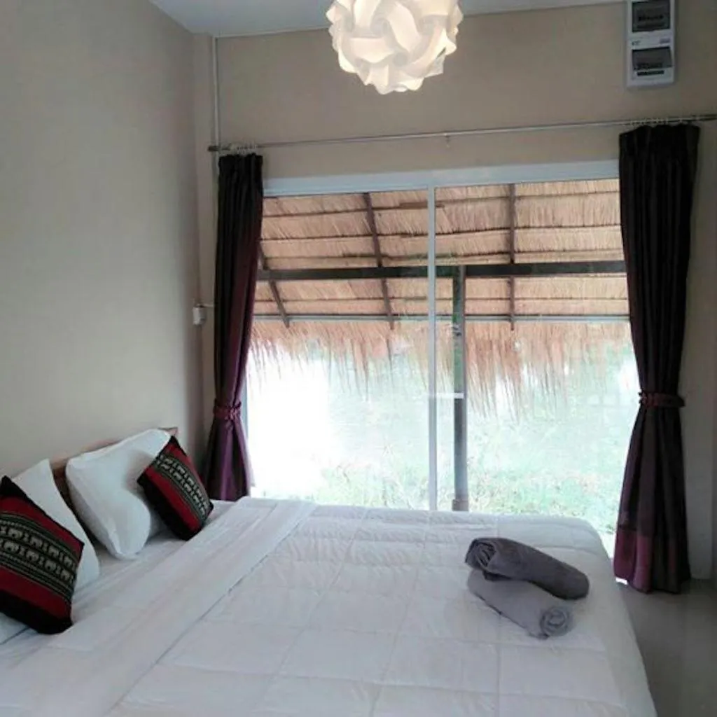 Bed in Suwi Coco Ville Resort