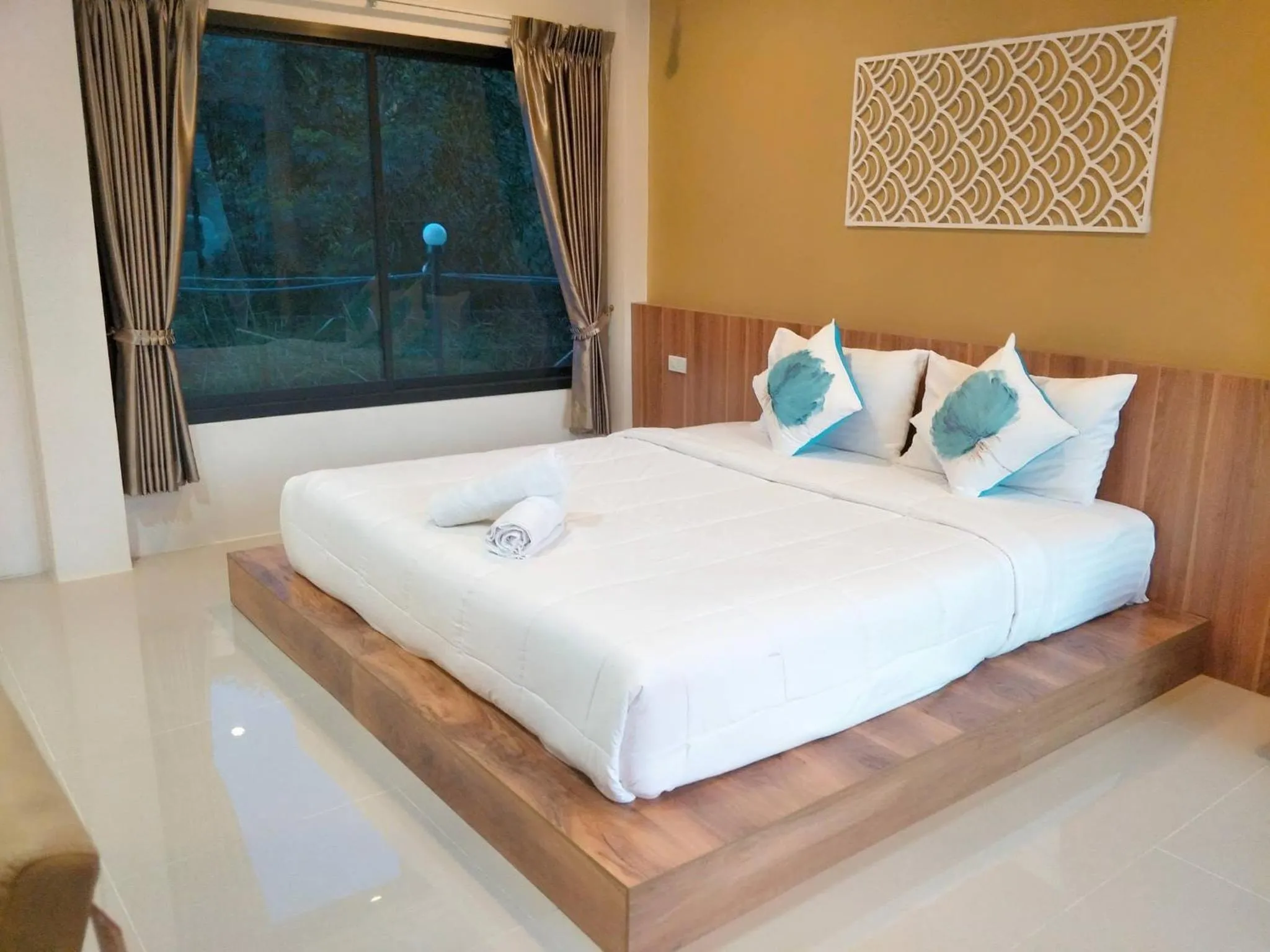 Bed in Suwi Coco Ville Resort