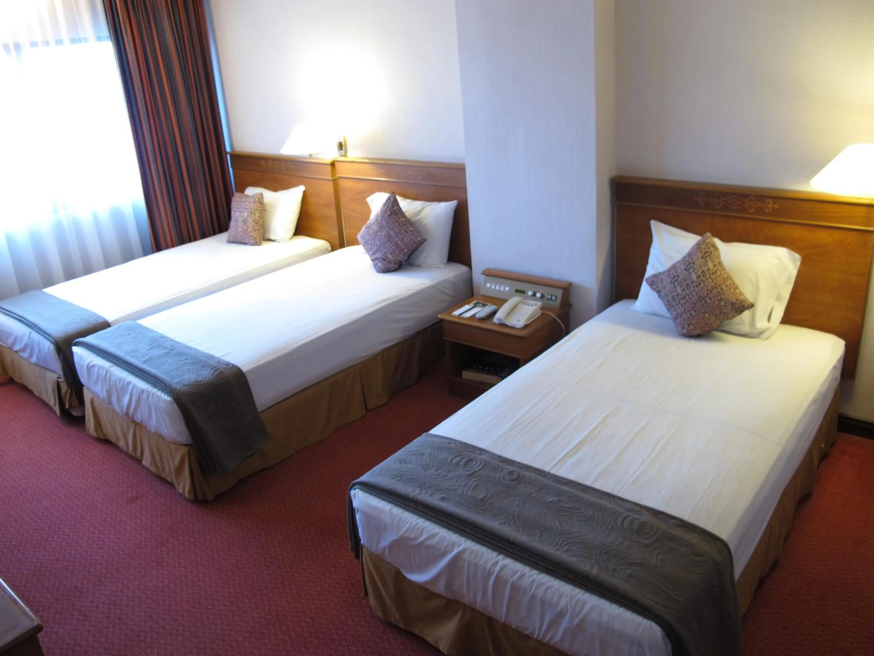 Bed in Hotel Grand Continental Kuching