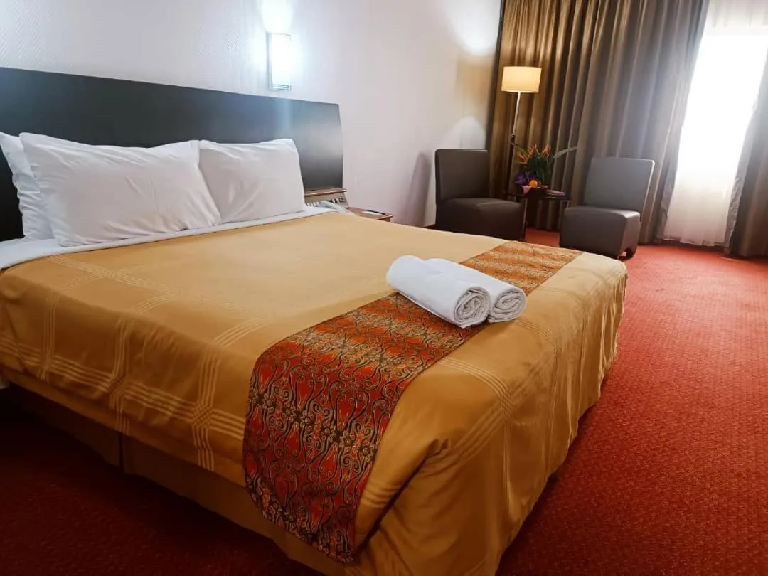 Bed in Hotel Grand Continental Kuching