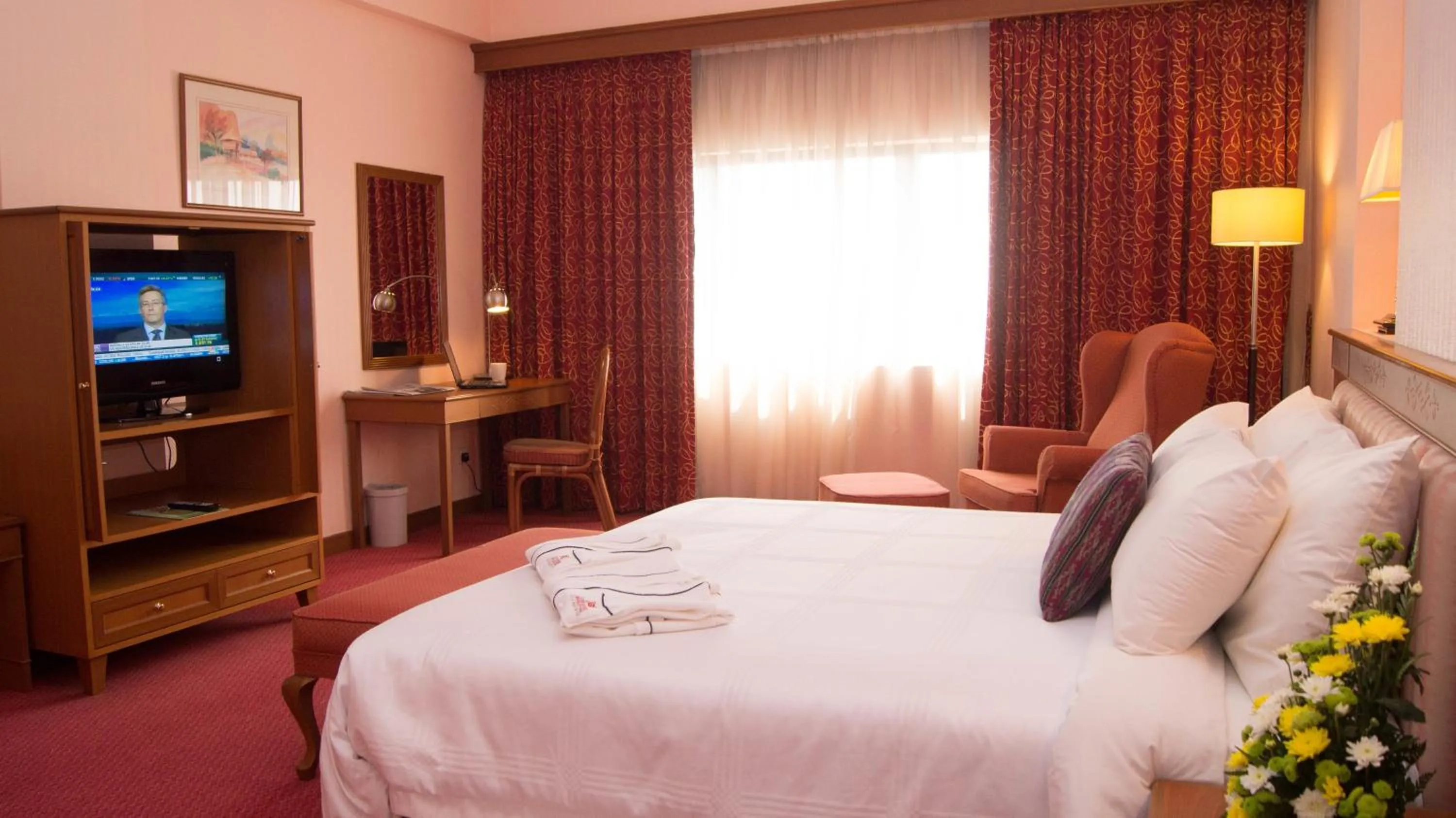 Photo of the whole room, Bed in Hotel Grand Continental Kuching